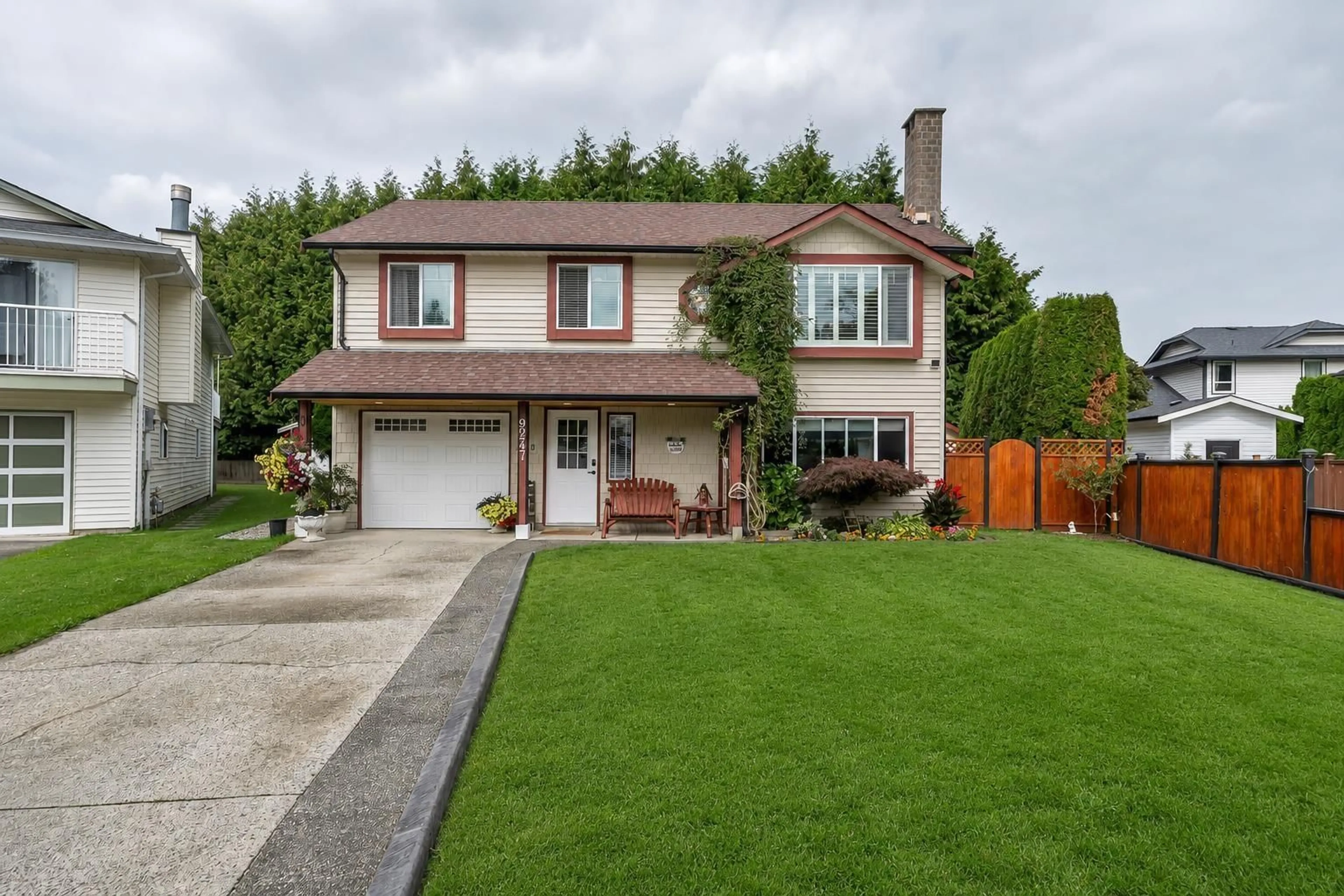 Home with vinyl exterior material, street for 9247 214 STREET, Langley British Columbia V1M1P4