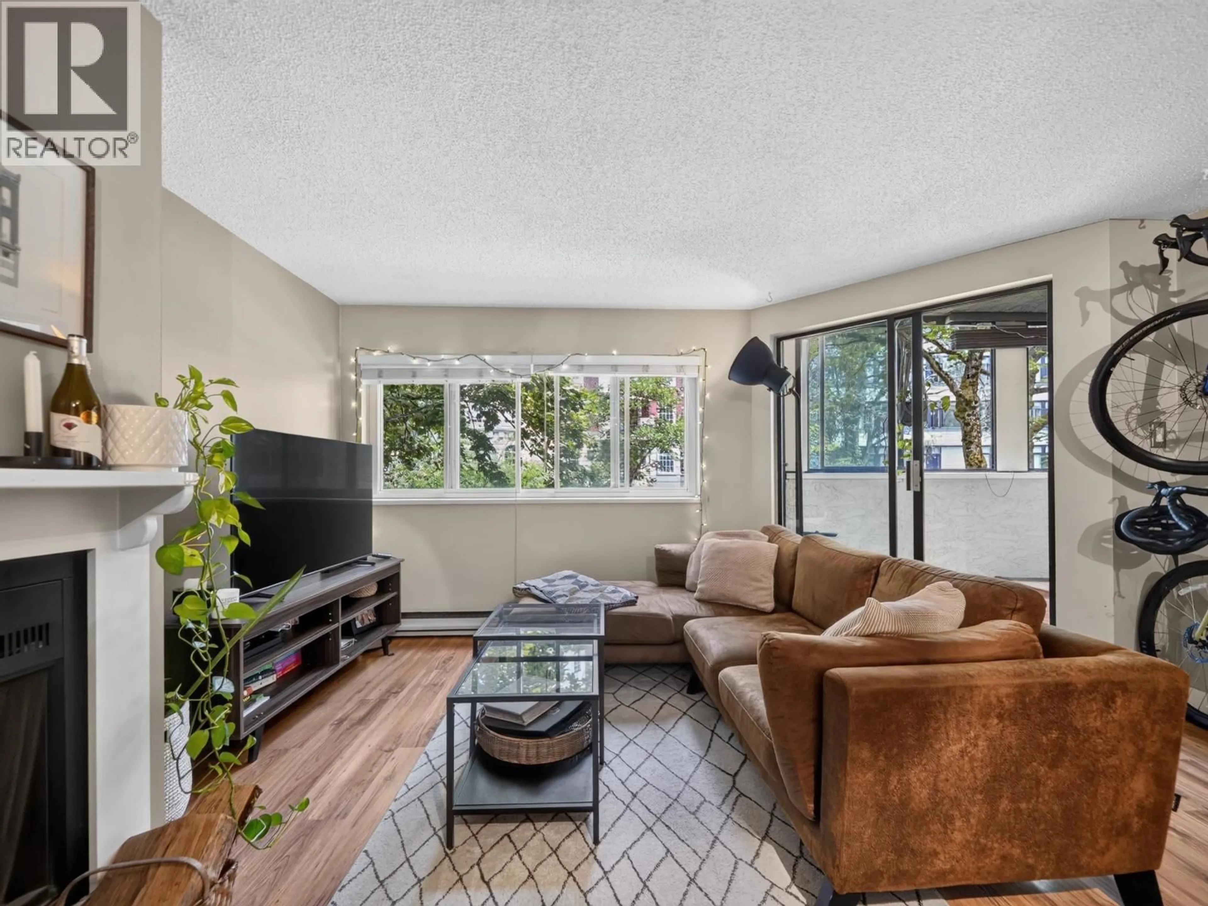 Living room with furniture, unknown for 202 - 936 BUTE STREET, Vancouver British Columbia V6E1Y8