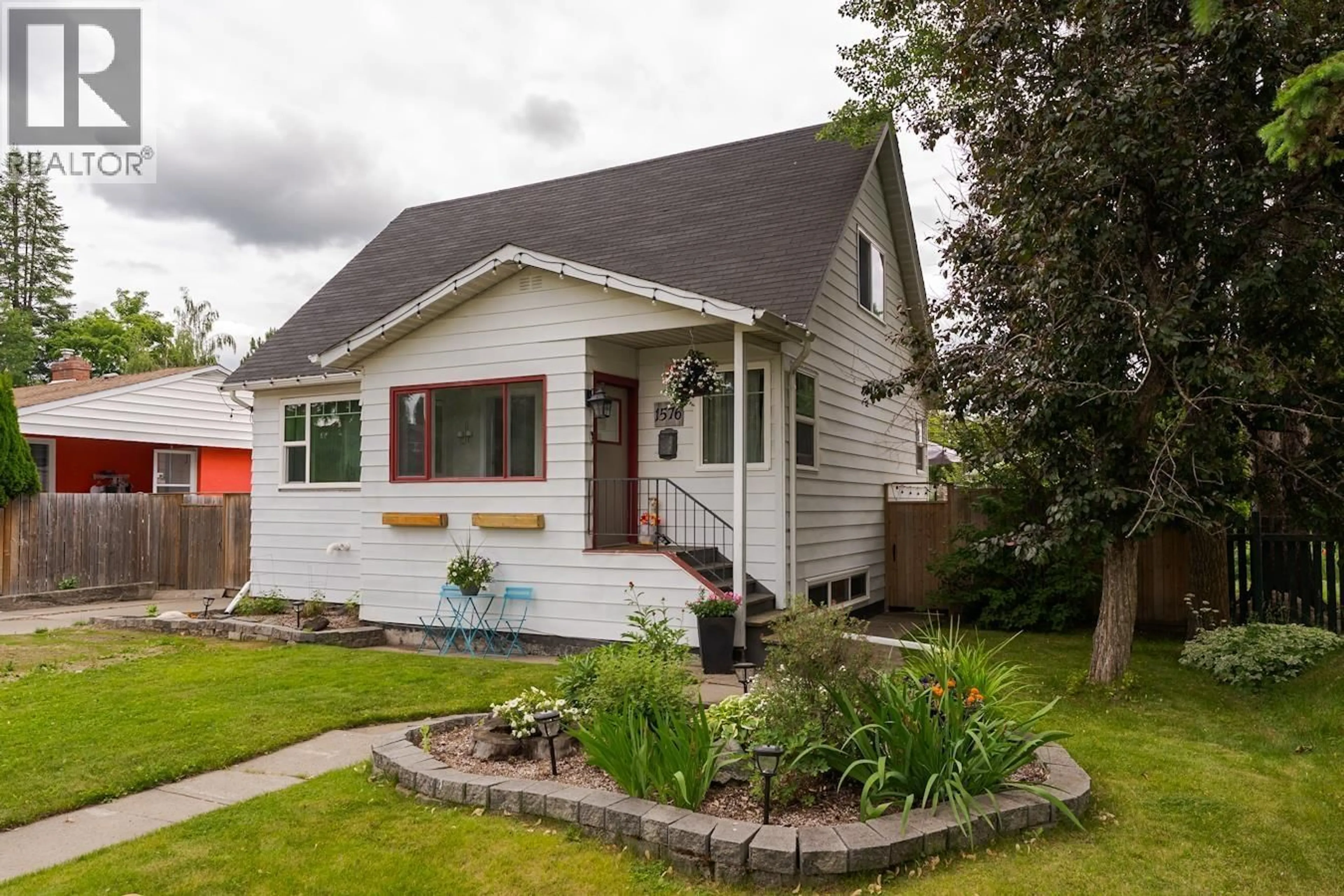 Home with vinyl exterior material, street for 1576 HEMLOCK STREET, Prince George British Columbia V2L1H9
