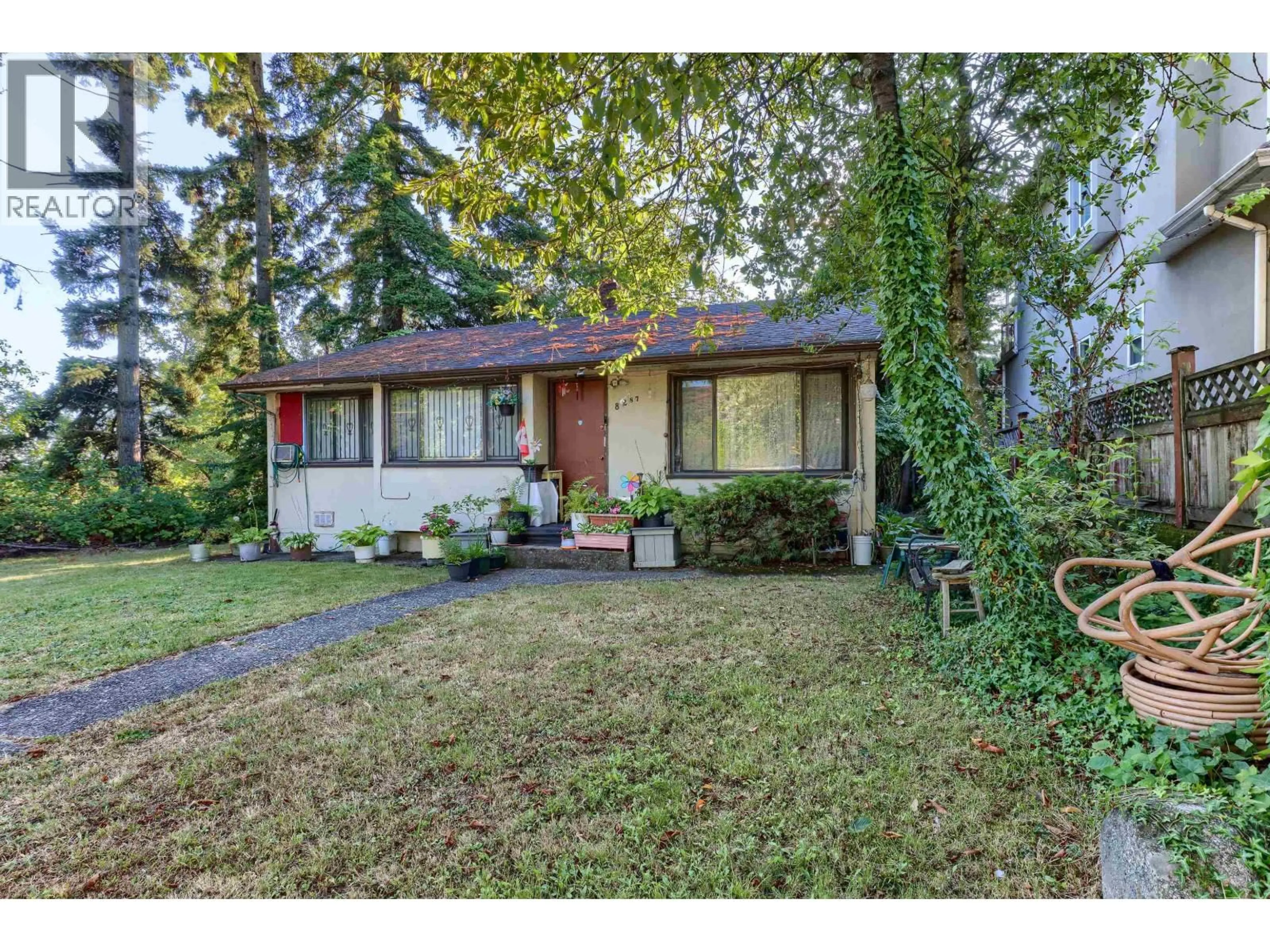 Home with vinyl exterior material, street for 8287 VICTORIA DRIVE, Vancouver British Columbia V5P4A7