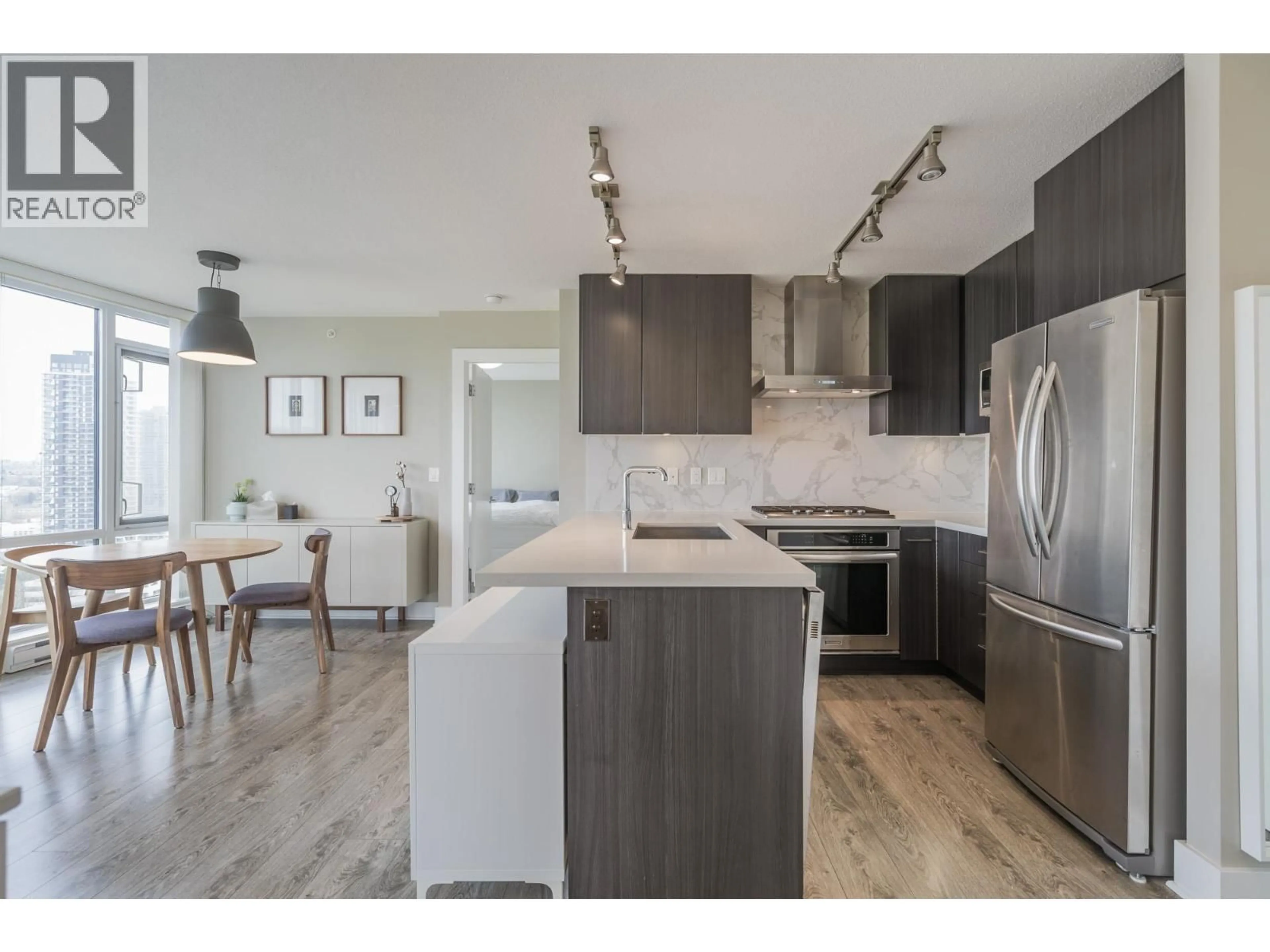 Open concept kitchen, wood/laminate floor for 2009 - 4189 HALIFAX STREET, Burnaby British Columbia V5C0H9