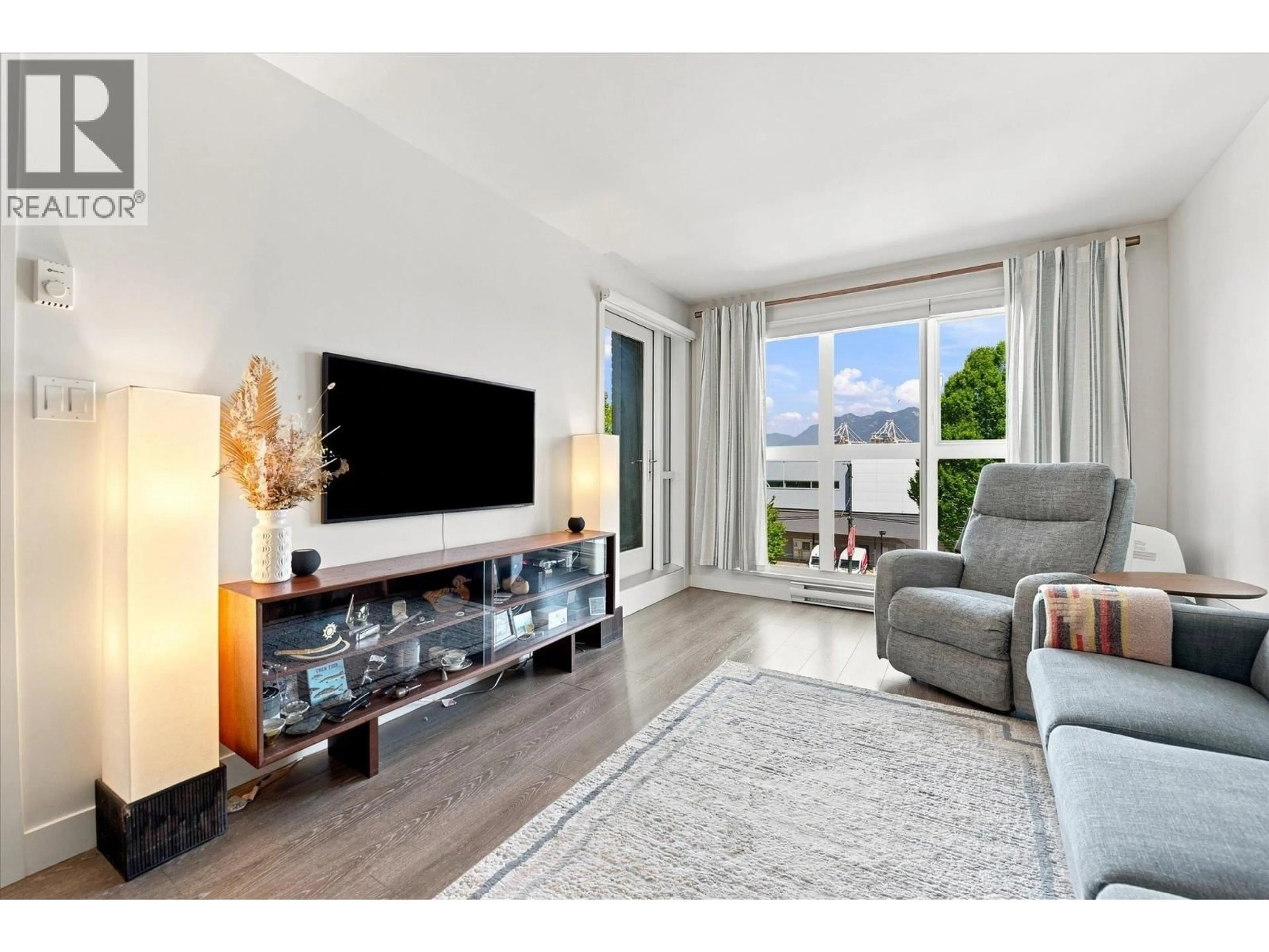 Living room with furniture, unknown for 323 - 1588 HASTINGS STREET, Vancouver British Columbia V5L0B8