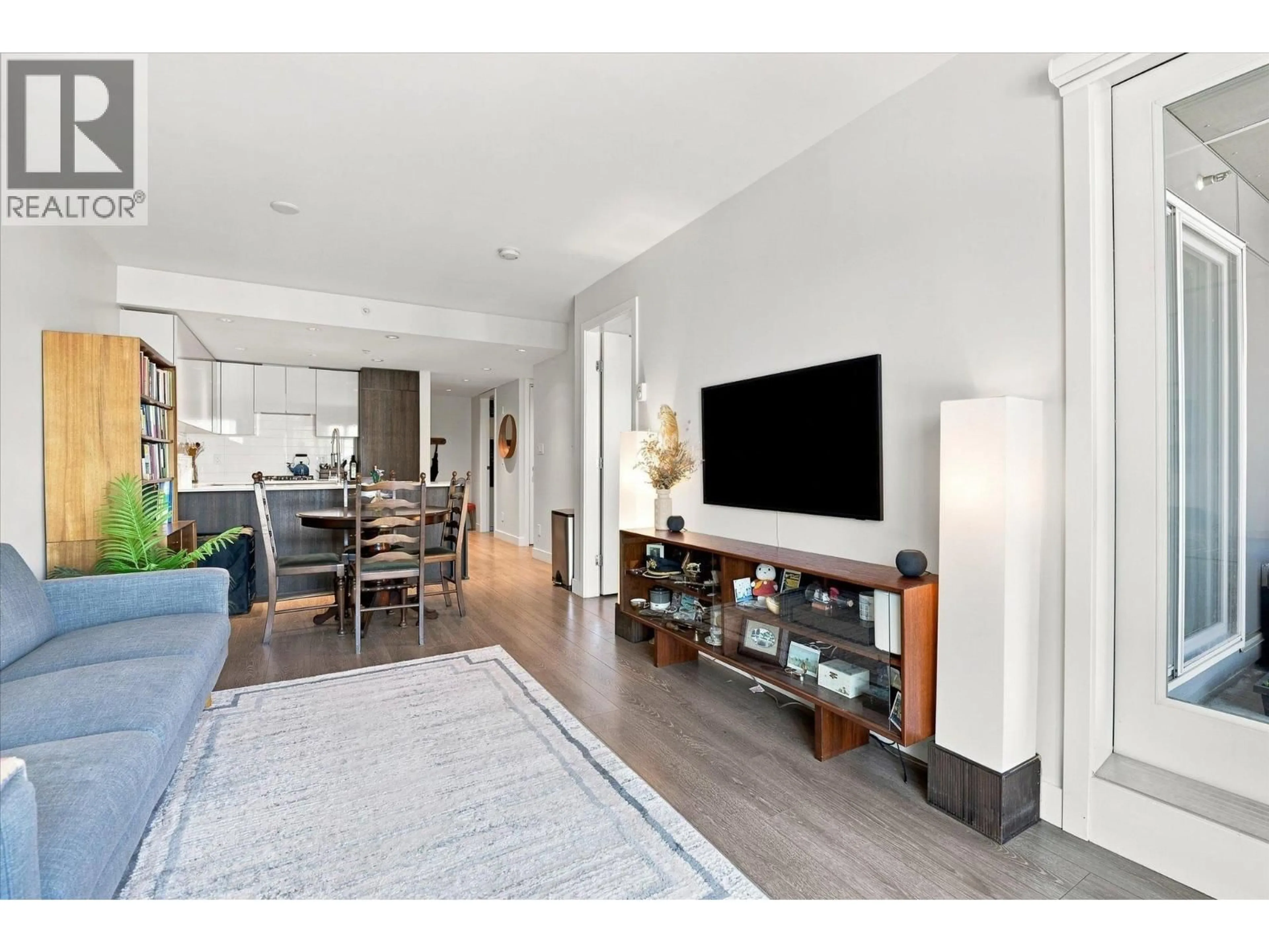 Living room with furniture, wood/laminate floor for 323 - 1588 HASTINGS STREET, Vancouver British Columbia V5L0B8