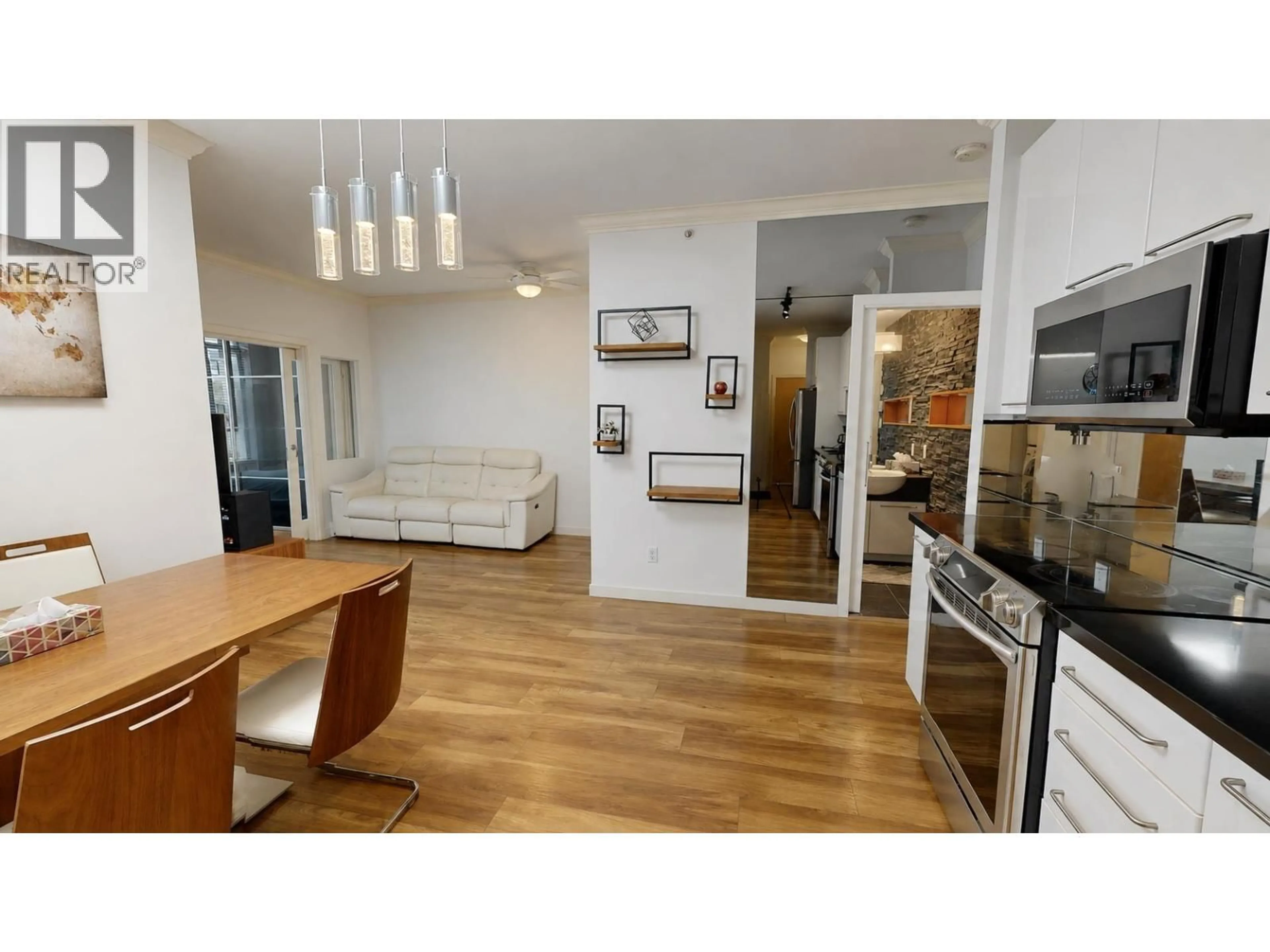 Open concept kitchen, wood/laminate floor for 505 - 828 CARDERO STREET, Vancouver British Columbia V6G2G5