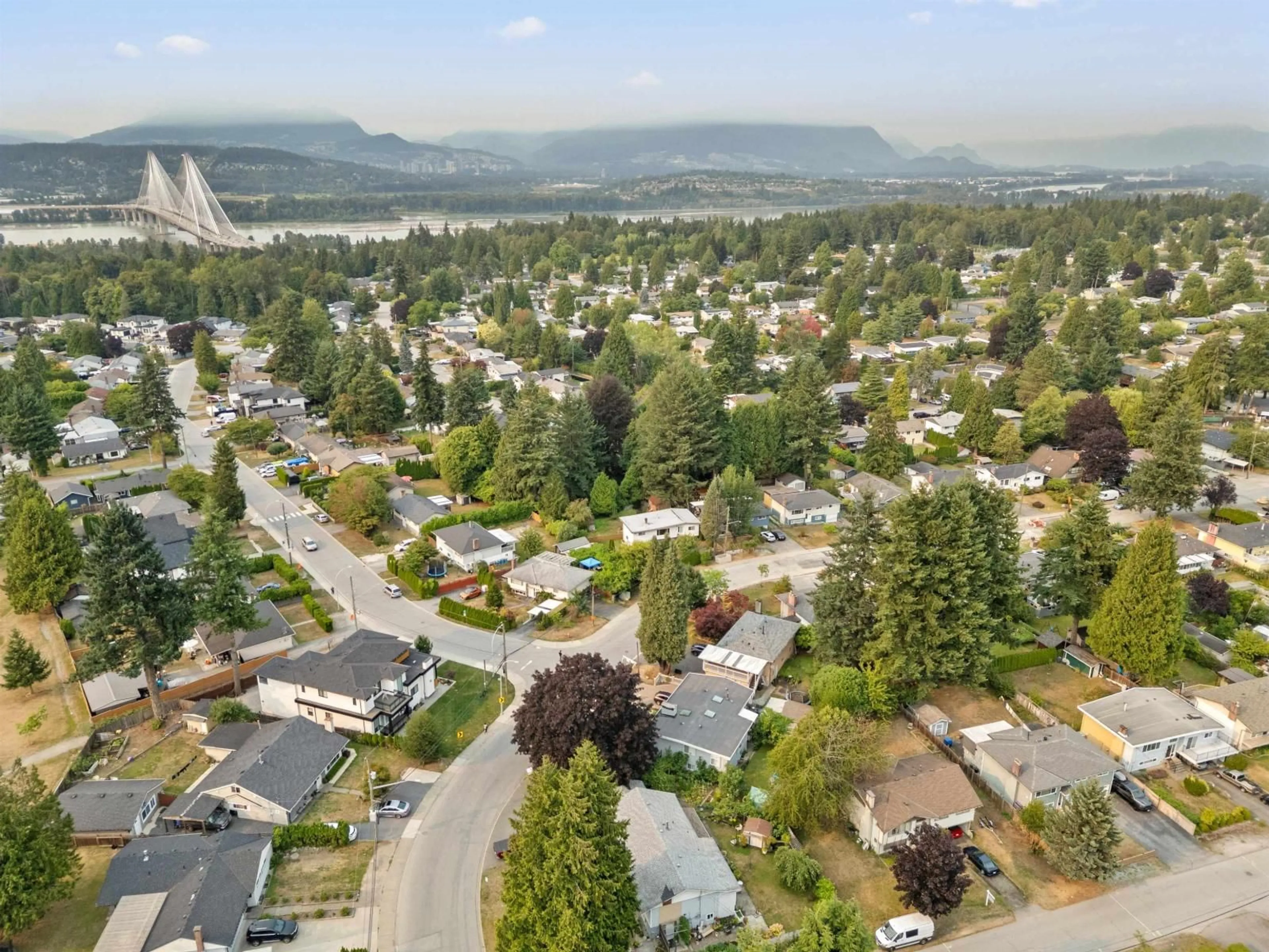A pic from outside/outdoor area/front of a property/back of a property/a pic from drone, mountain view for 14935 CANARY DRIVE, Surrey British Columbia V3R4V2