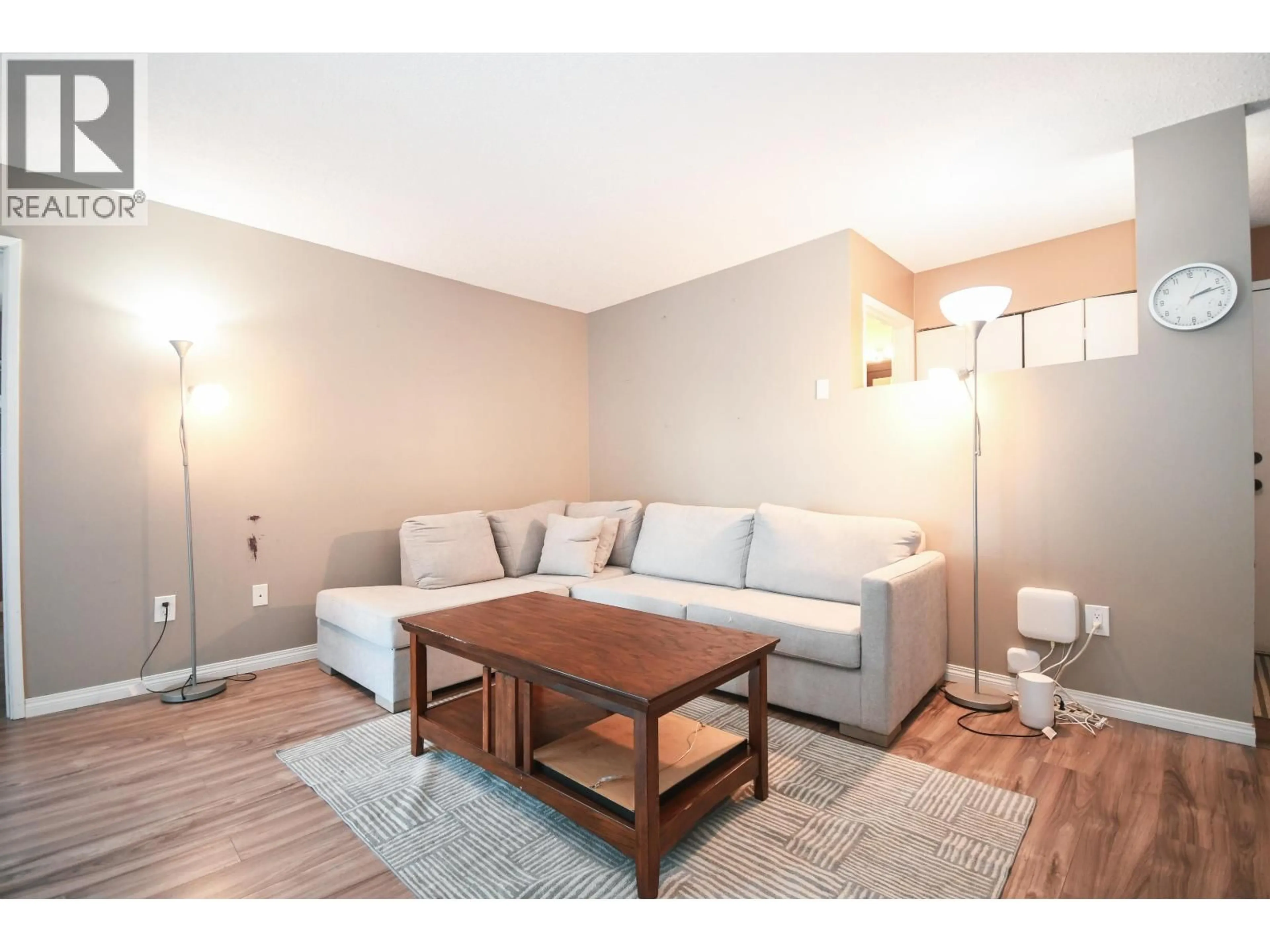 Living room with furniture, wood/laminate floor for 214 - 3033 OSPIKA BOULEVARD, Prince George British Columbia V2N4L5
