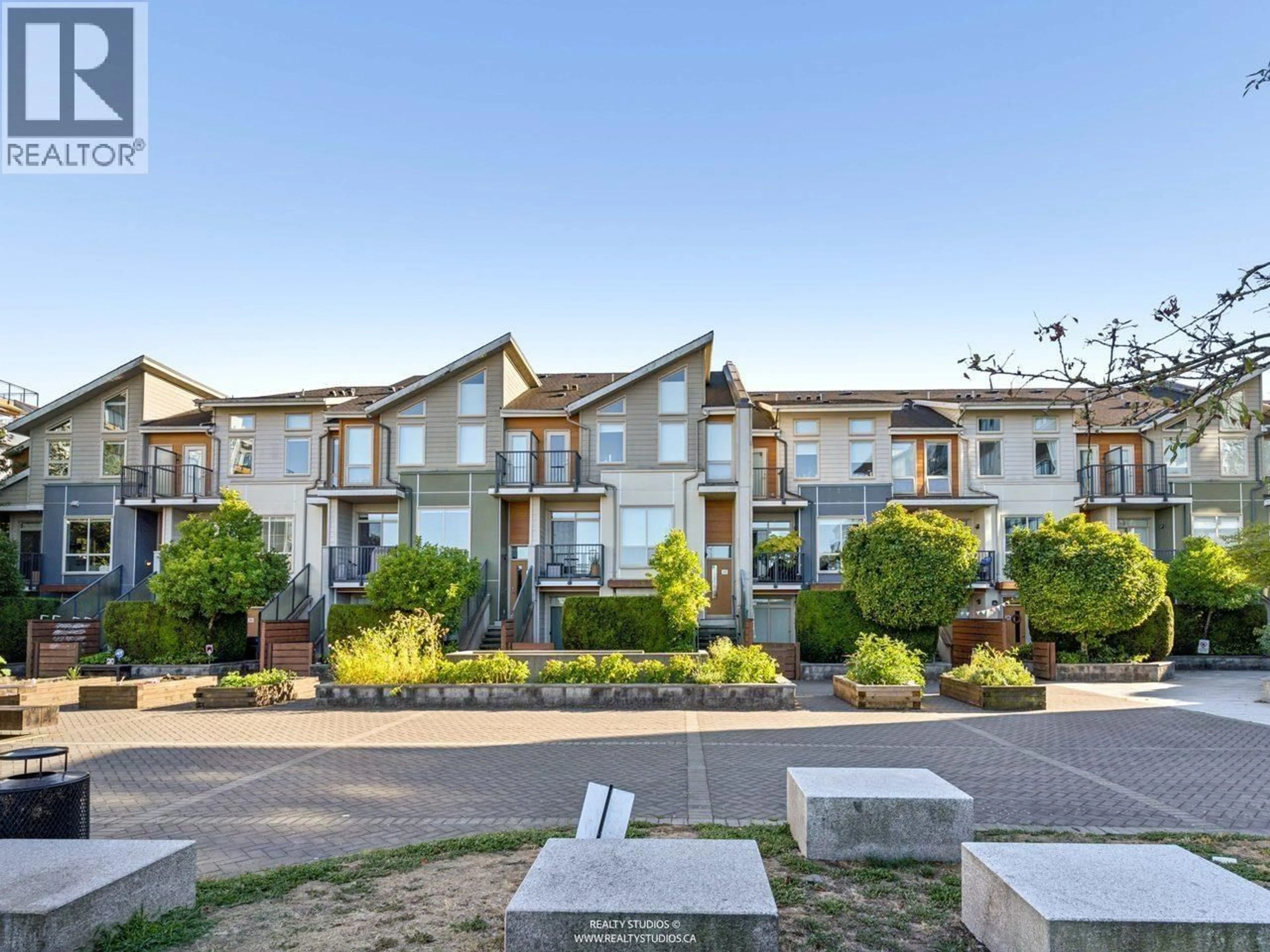 A pic from outside/outdoor area/front of a property/back of a property/a pic from drone, street for 24 - 10133 RIVER DRIVE, Richmond British Columbia V6X0K8