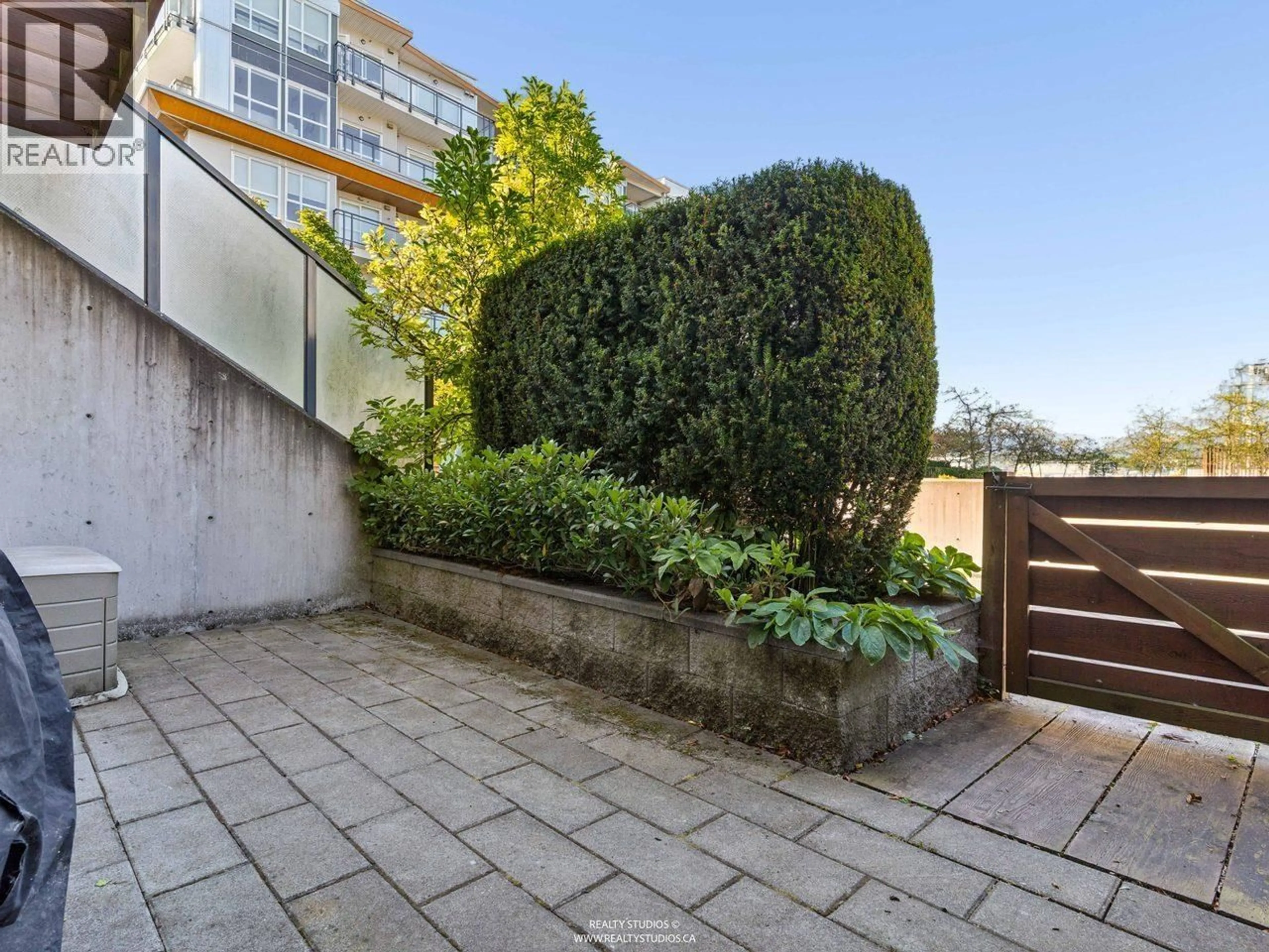 A pic from outside/outdoor area/front of a property/back of a property/a pic from drone, street for 24 - 10133 RIVER DRIVE, Richmond British Columbia V6X0K8