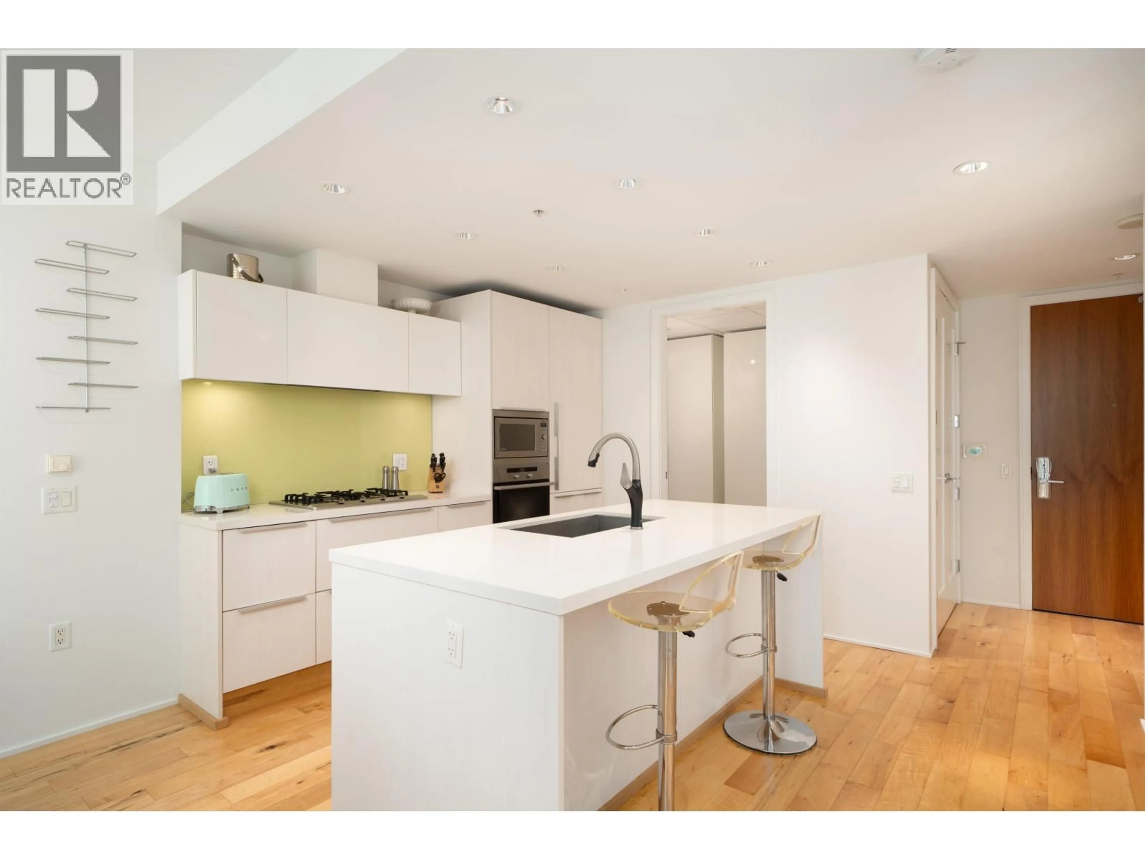 Contemporary kitchen, wood/laminate floor for 406 - 1661 ONTARIO STREET, Vancouver British Columbia V5Y0C3