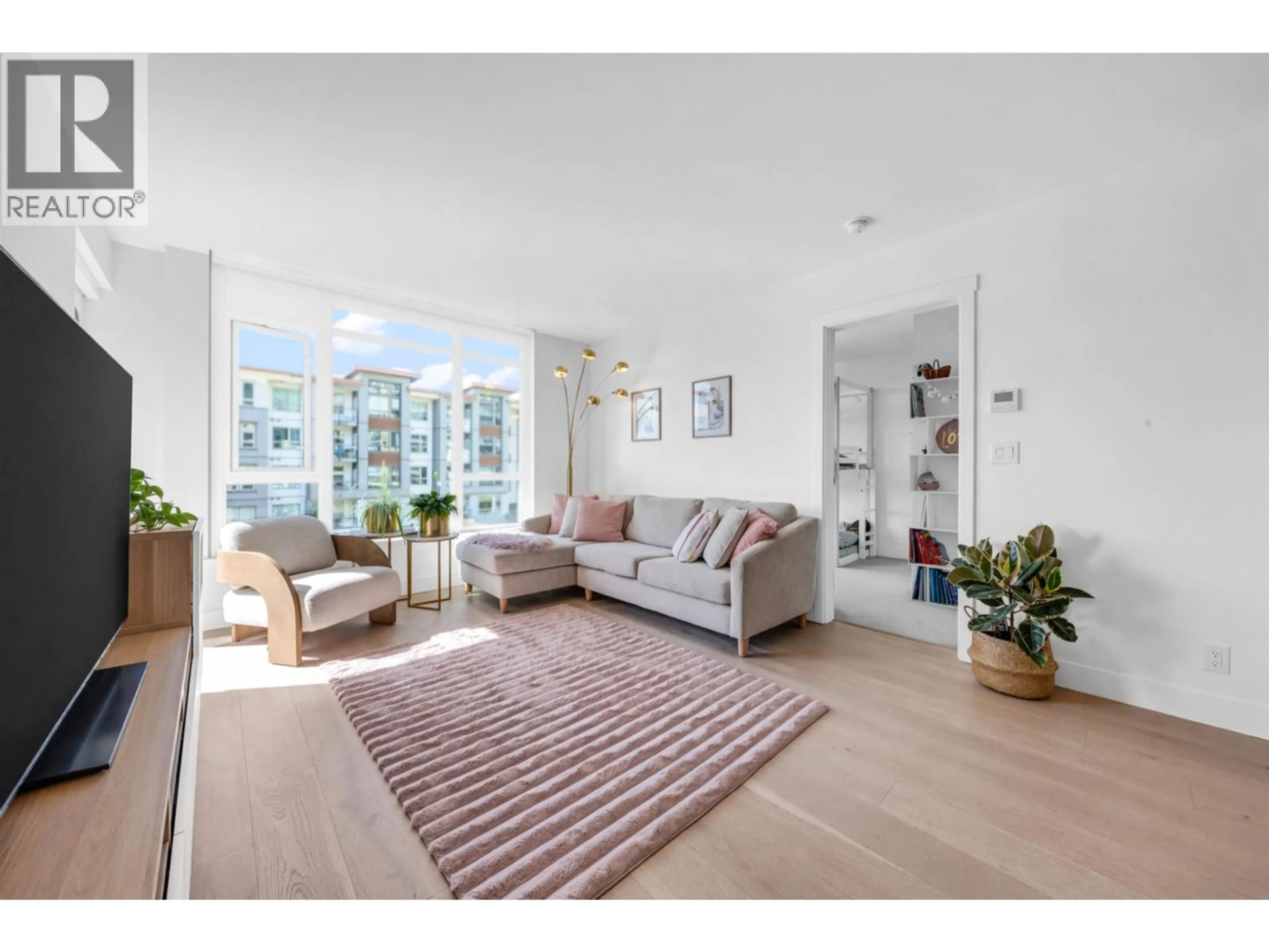 Living room with furniture, unknown for 305 - 2707 LIBRARY LANE, North Vancouver British Columbia V7J0C6