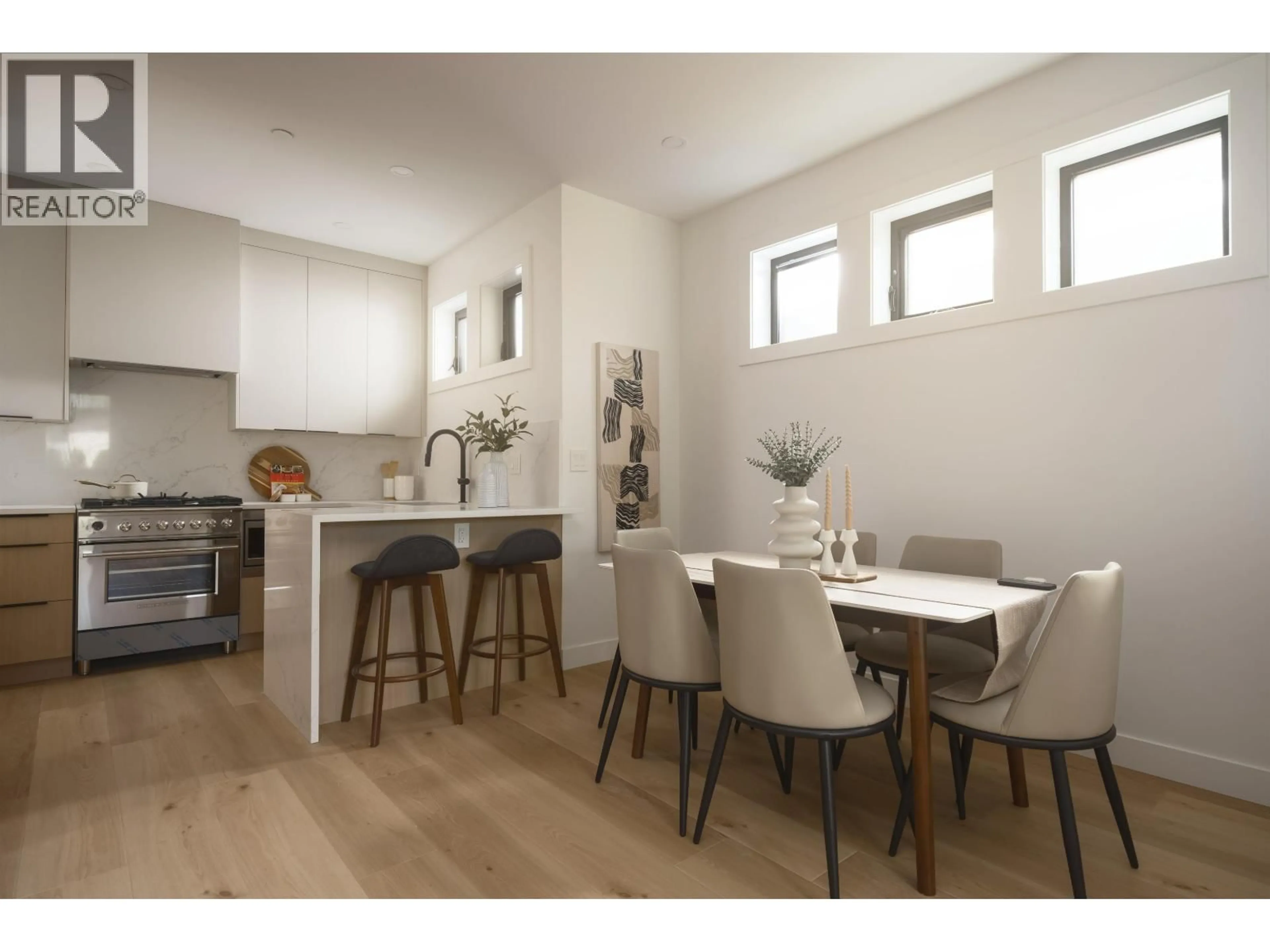 Open concept kitchen, wood/laminate floor for 920 16TH AVENUE, Vancouver British Columbia V5T2V9