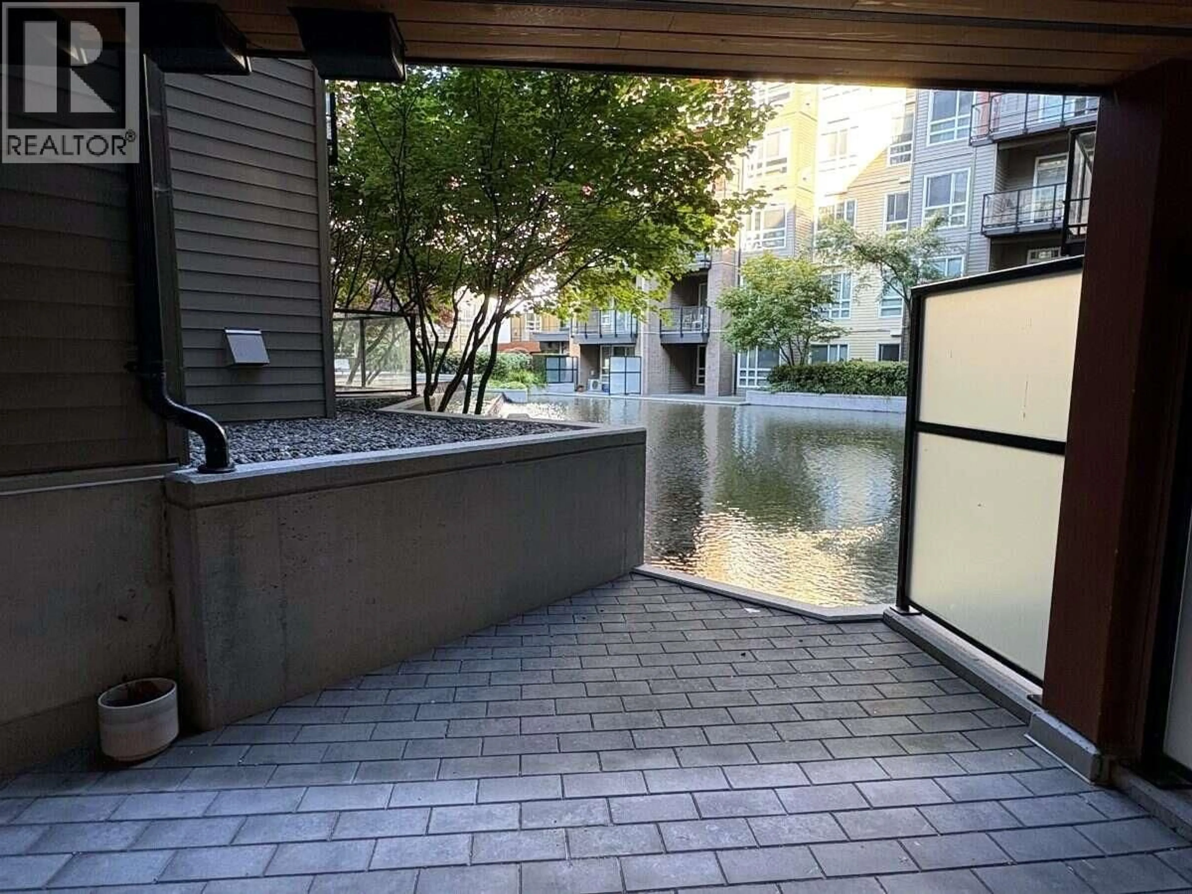 Patio, water/lake/river/ocean view for 106 - 3462 ROSS DRIVE, Vancouver British Columbia V6S0H6