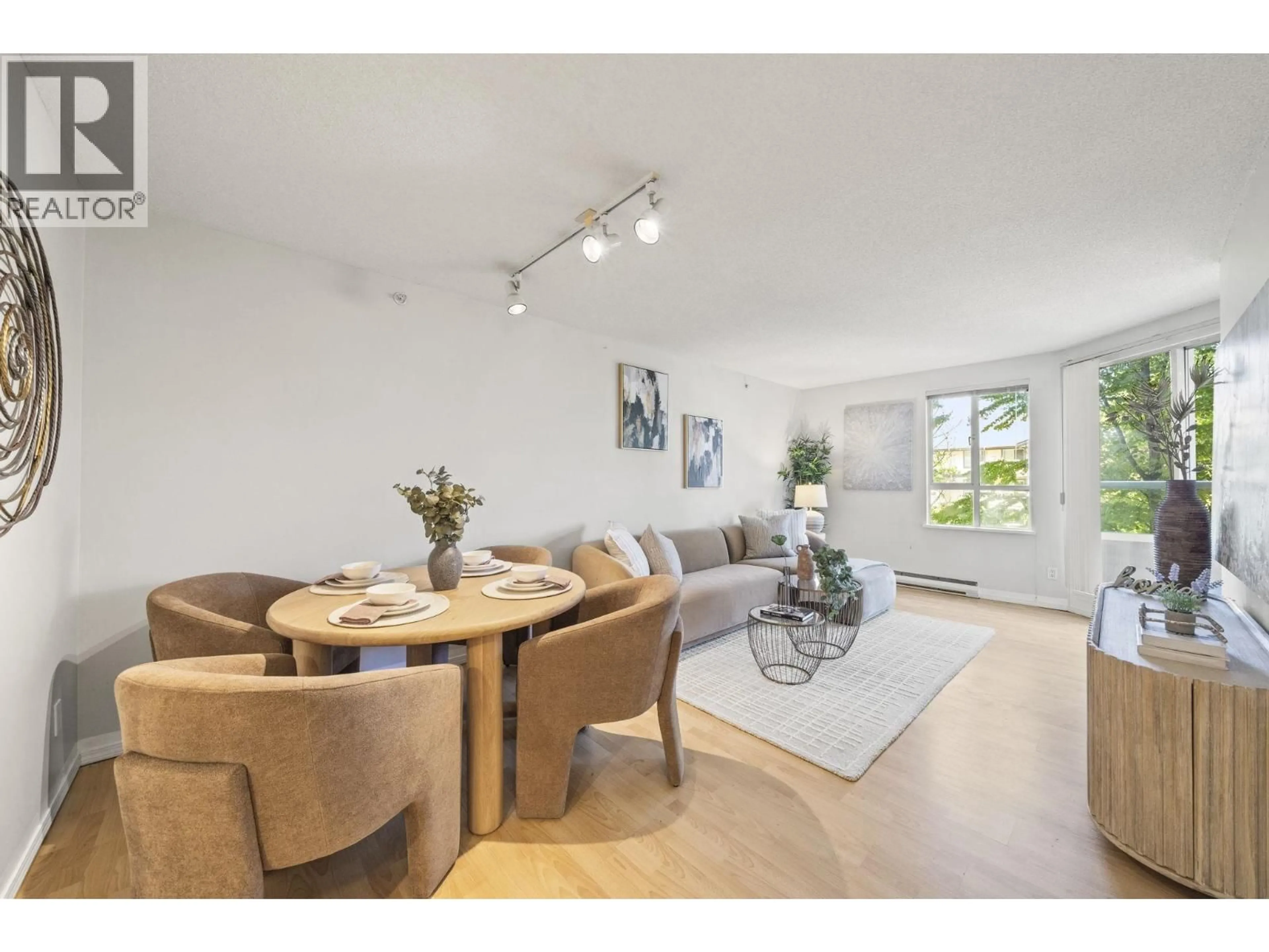 Living room with furniture, unknown for 406 - 3489 ASCOT PLACE, Vancouver British Columbia V5R6B6