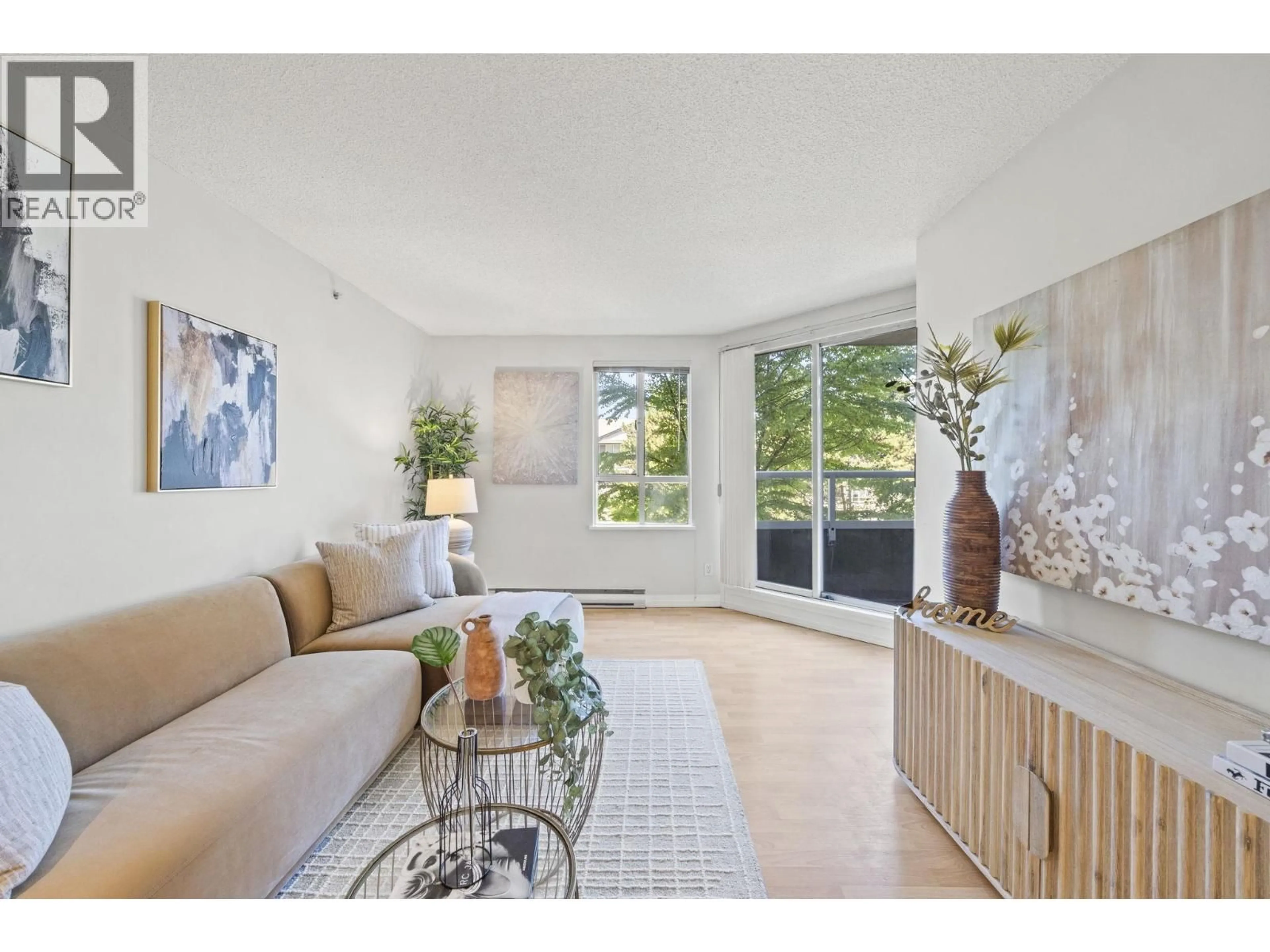 Living room with furniture, unknown for 406 - 3489 ASCOT PLACE, Vancouver British Columbia V5R6B6