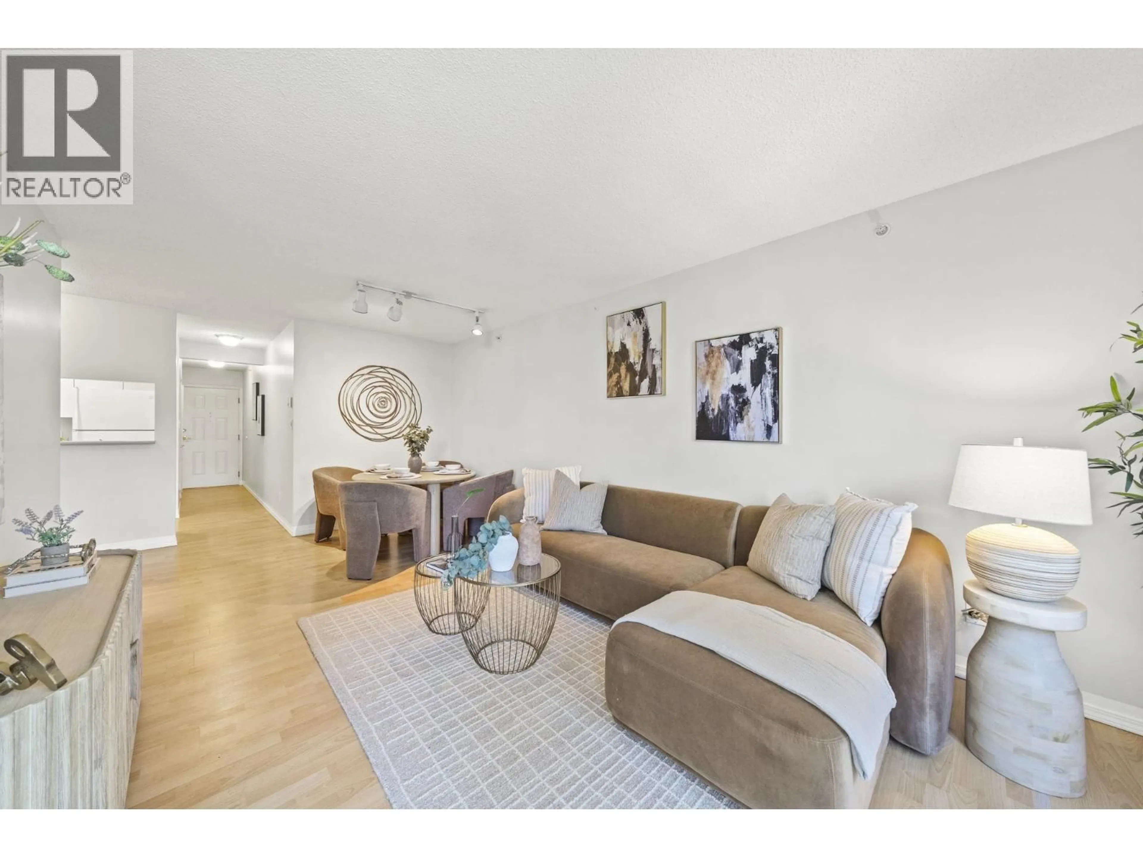 Living room with furniture, unknown for 406 - 3489 ASCOT PLACE, Vancouver British Columbia V5R6B6