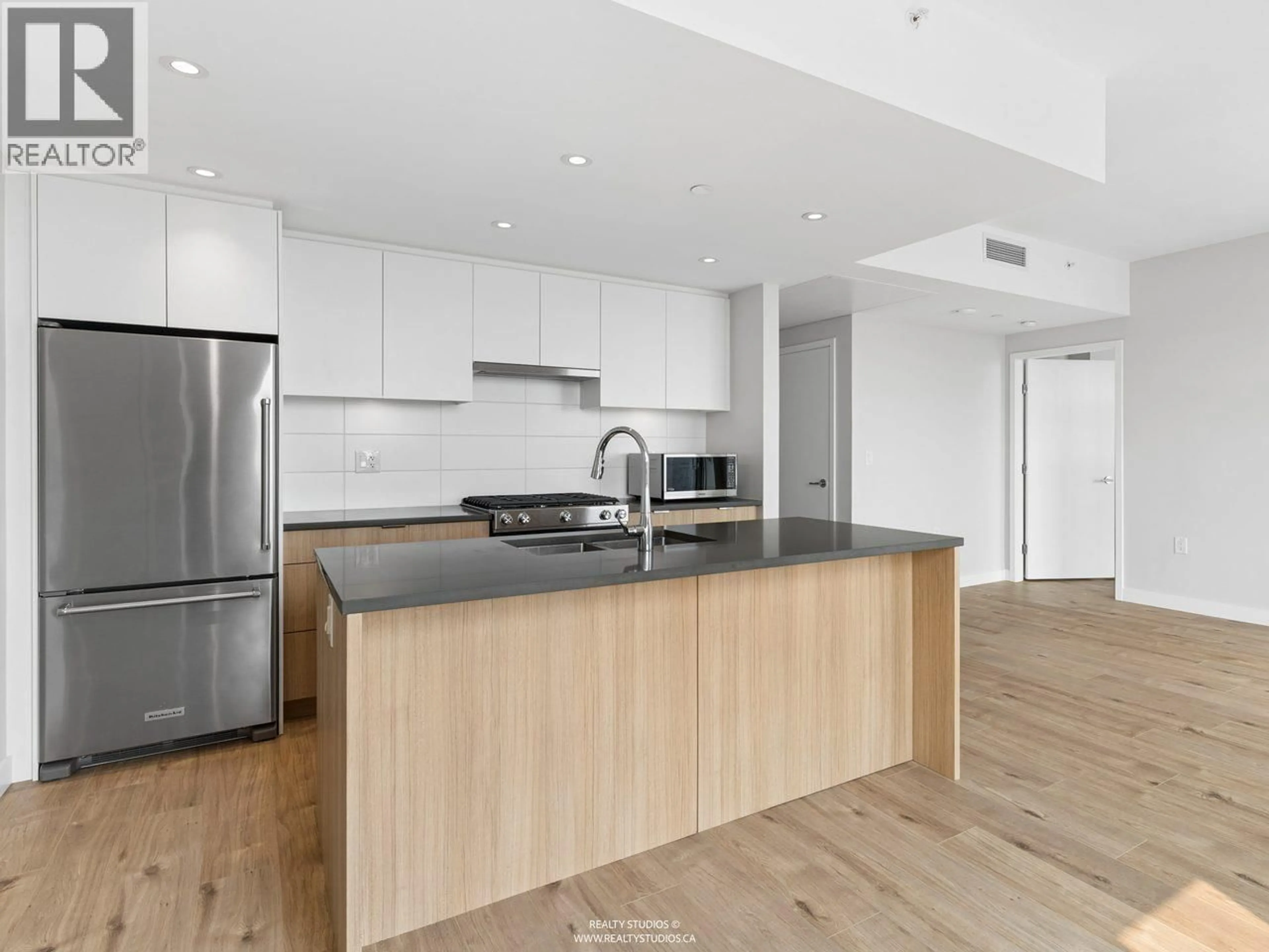 Open concept kitchen, unknown for 1401 - 3430 KENT AVENUE, Vancouver British Columbia V5S0G7