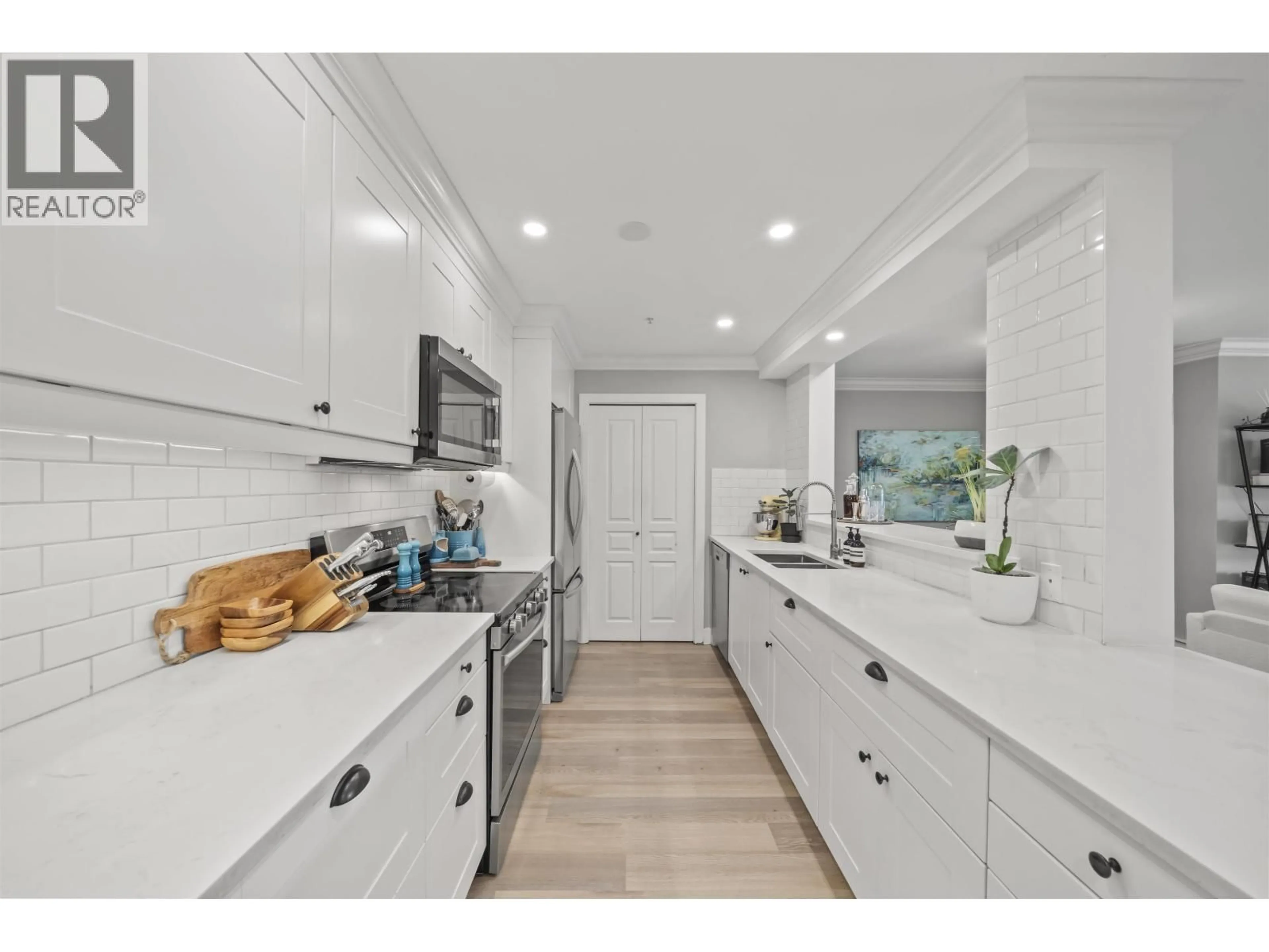 Open concept kitchen, ceramic/tile floor for 116 - 4770 52A STREET, Delta British Columbia V4K5B5