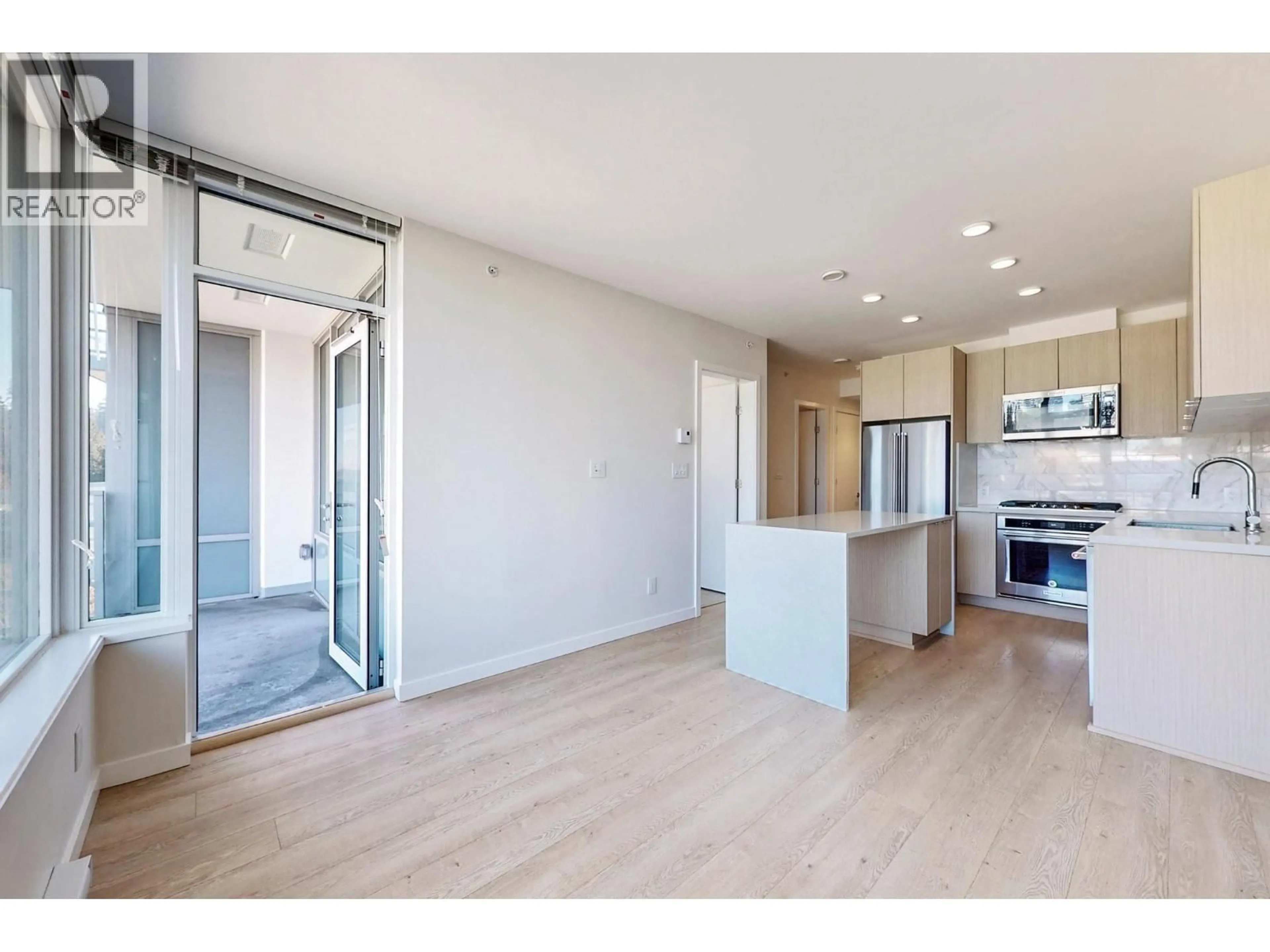 Open concept kitchen, wood/laminate floor for 503 - 530 WHITING WAY, Coquitlam British Columbia V3J0J4