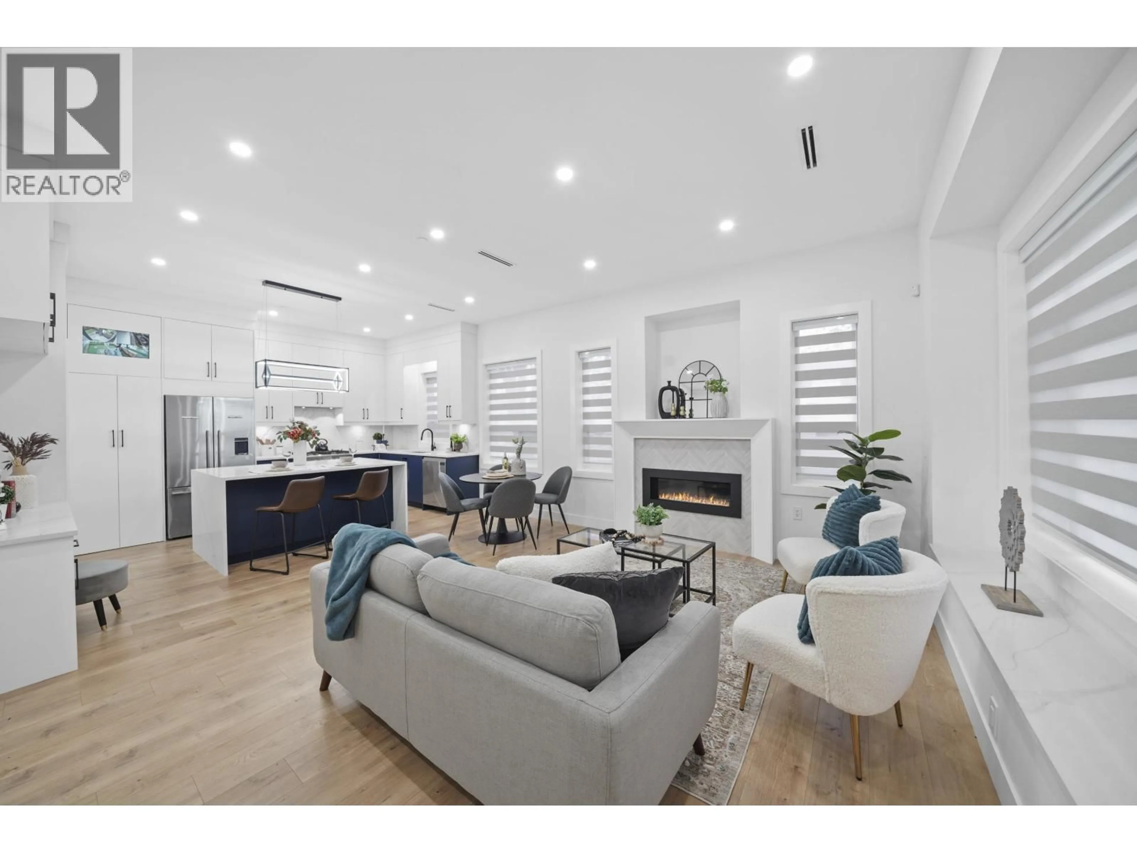 Open concept kitchen, wood/laminate floor for 2995 17TH AVENUE, Vancouver British Columbia V5M2N4