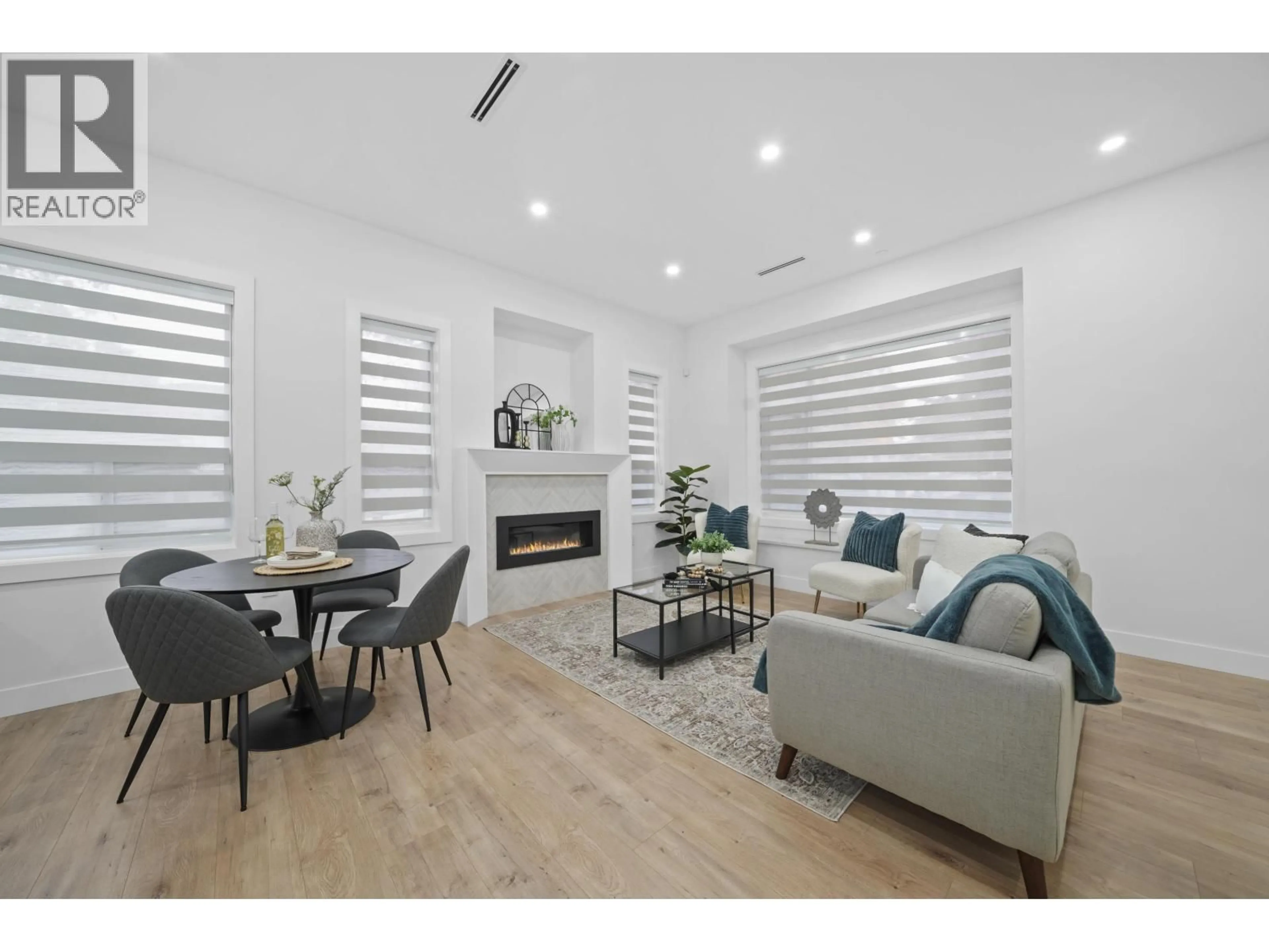 Living room with furniture, wood/laminate floor for 2995 17TH AVENUE, Vancouver British Columbia V5M2N4
