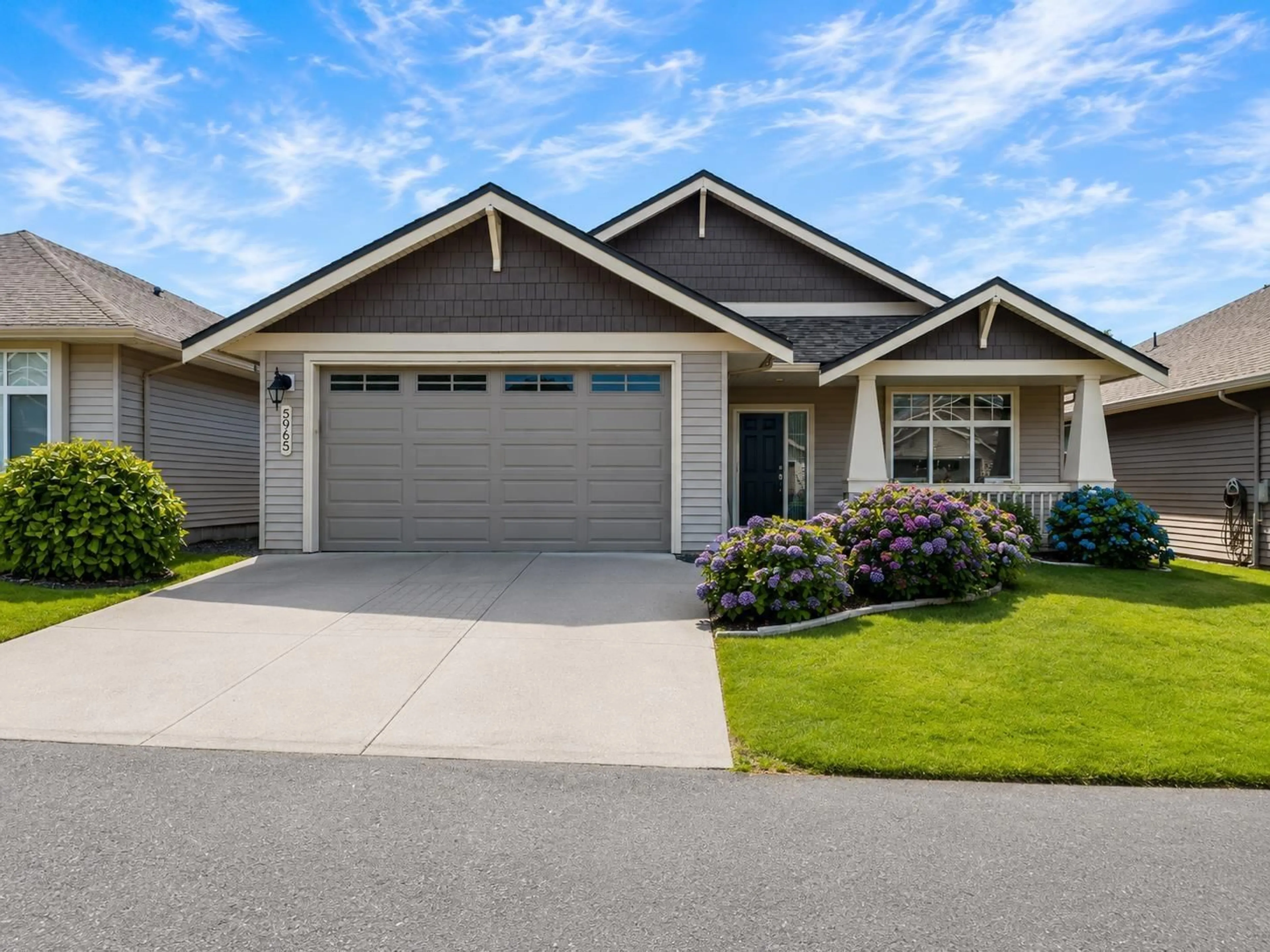 Home with vinyl exterior material, street for 5965 RIVERSTONE STREET, Chilliwack British Columbia V2R0E2