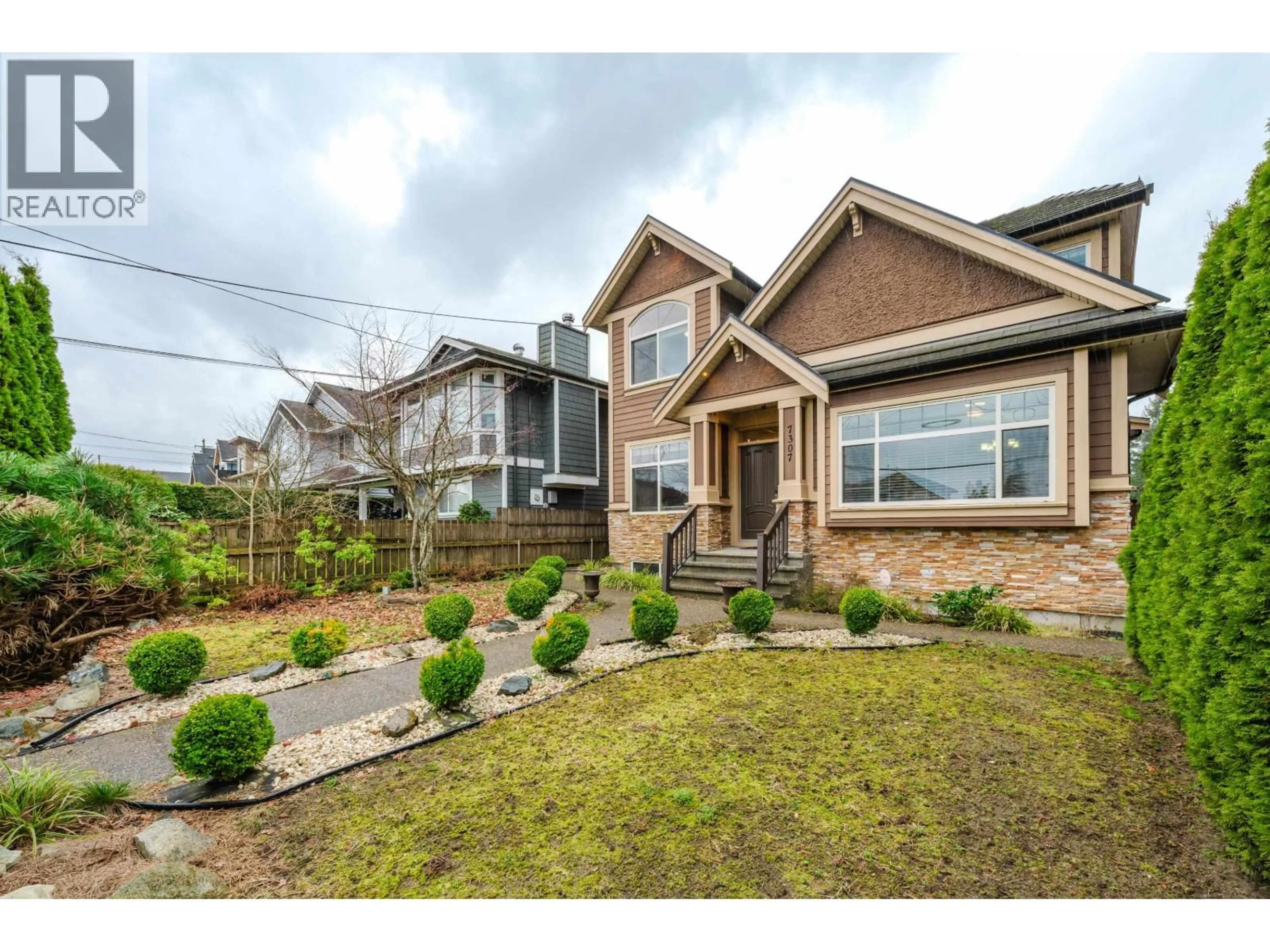 Home with brick exterior material, street for 7307 2ND STREET, Burnaby British Columbia V3N3P9