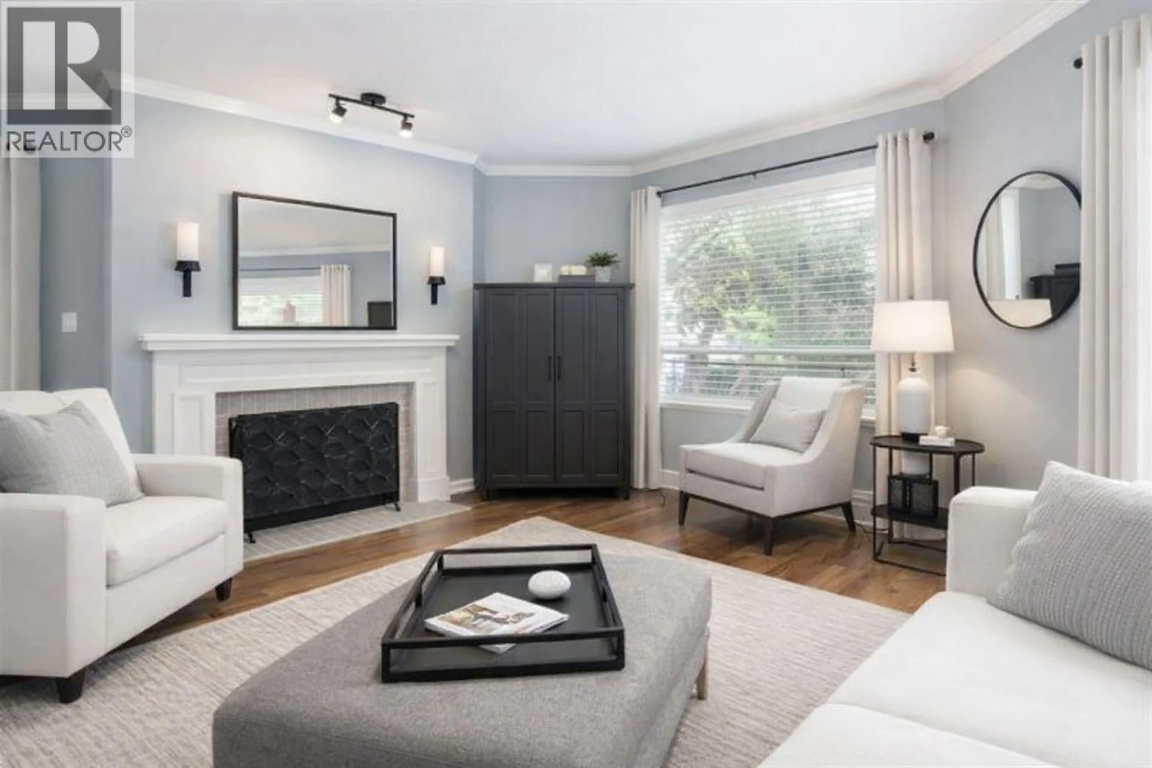 Living room with furniture, wood/laminate floor for 205 - 7840 MOFFATT ROAD, Richmond British Columbia V6Y1X8
