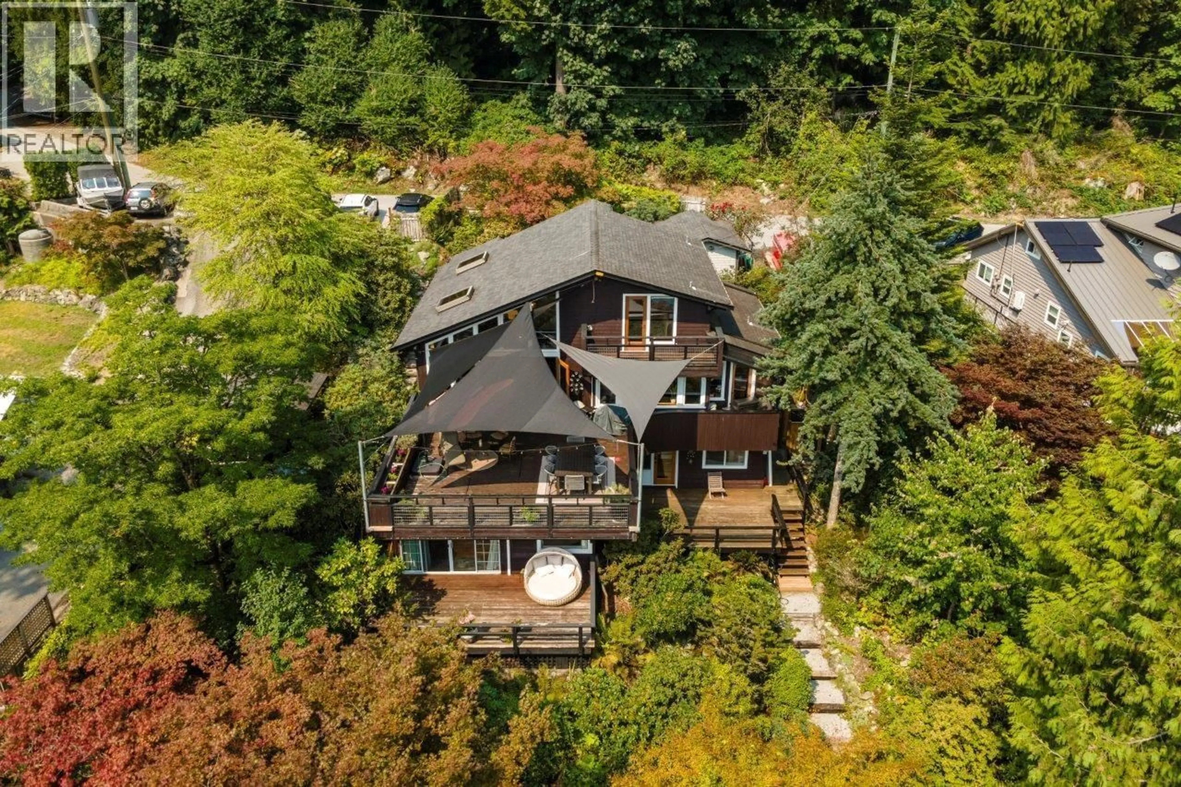 A pic from outside/outdoor area/front of a property/back of a property/a pic from drone, forest/trees view for 330 SASAMAT LANE, North Vancouver British Columbia V7G2S4