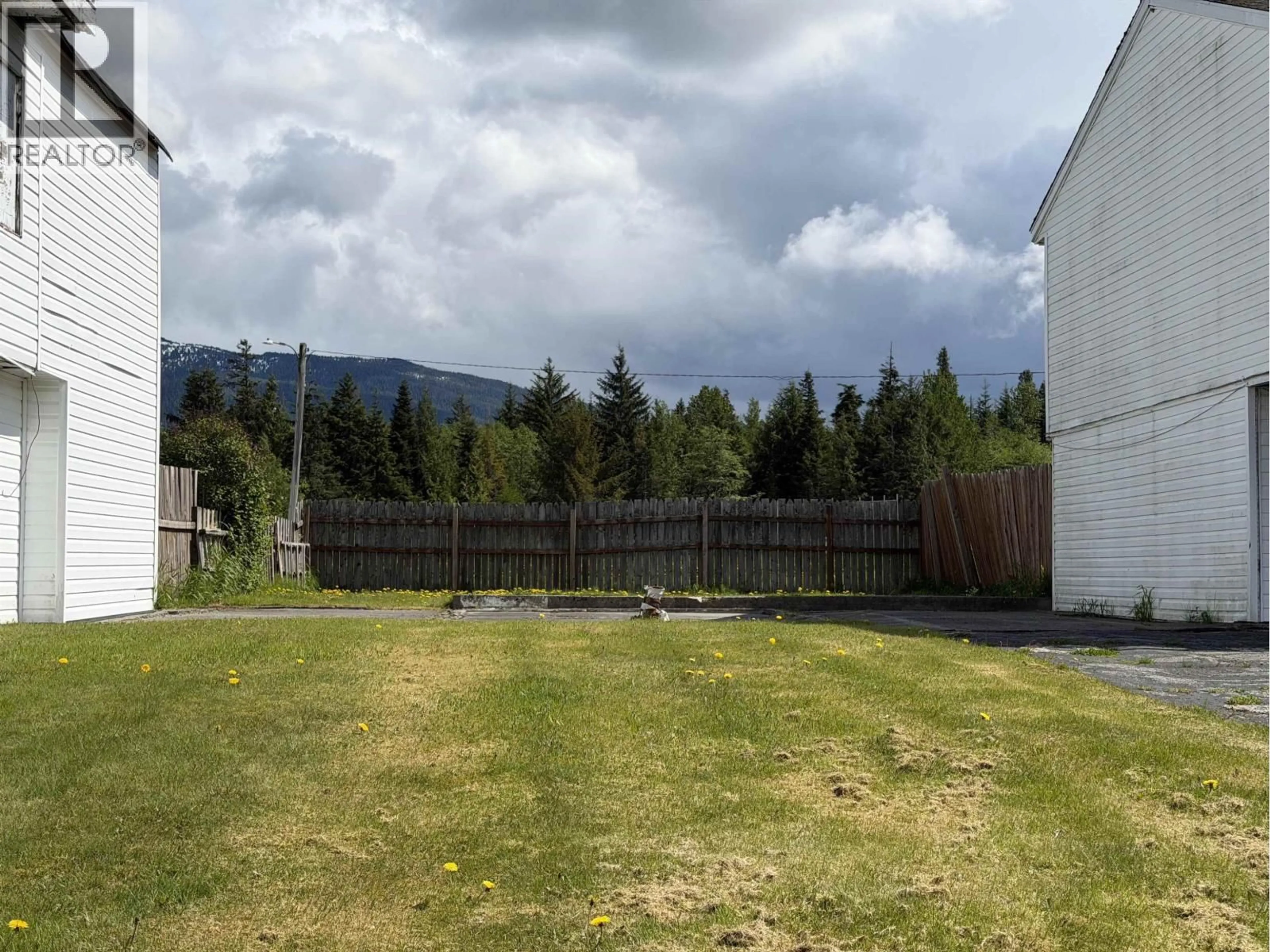 A pic from outside/outdoor area/front of a property/back of a property/a pic from drone, mountain view for 57 MALLARD STREET, Kitimat British Columbia V8C1N2