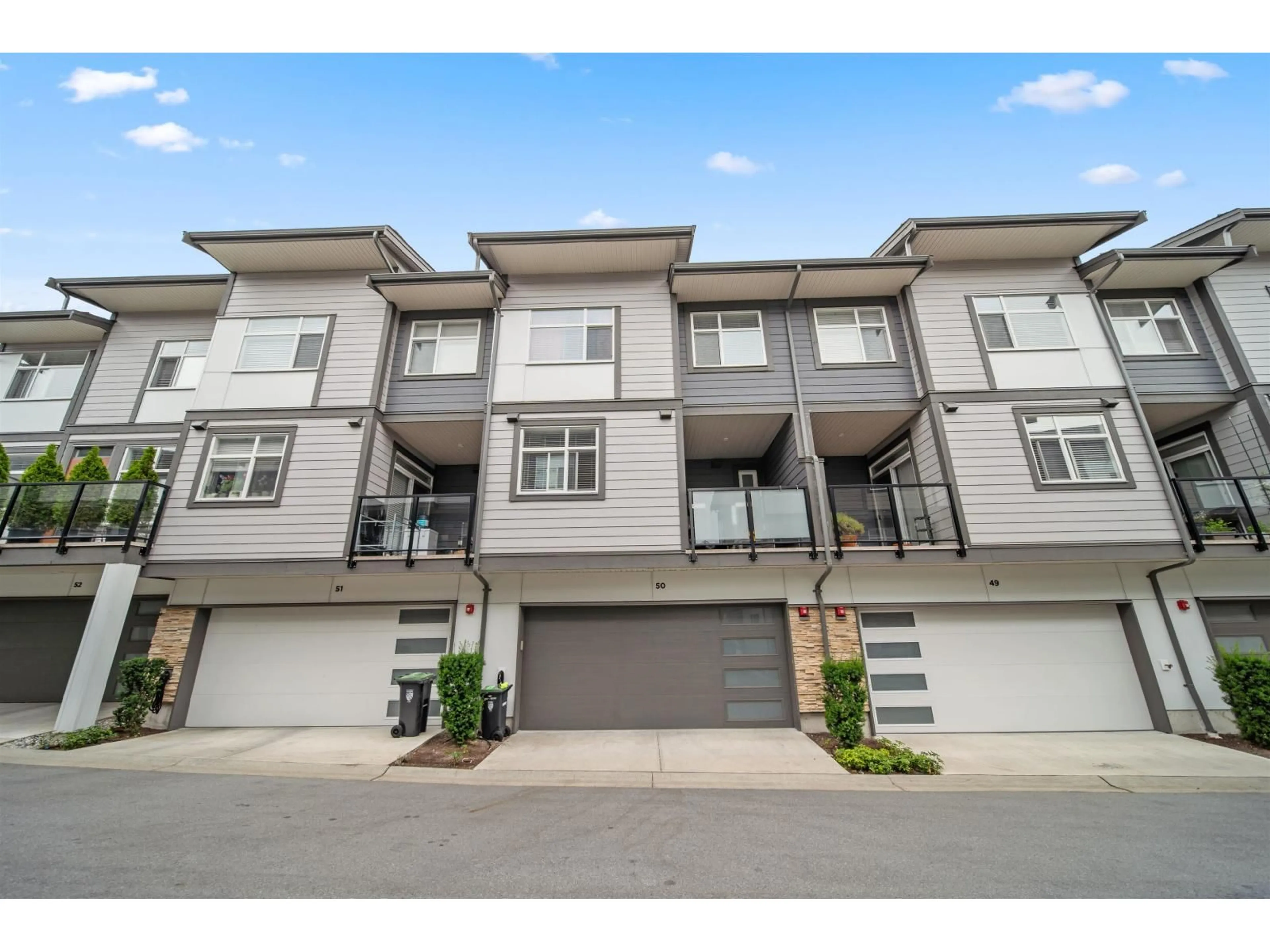 A pic from outside/outdoor area/front of a property/back of a property/a pic from drone, street for 50 - 8430 203A STREET, Langley British Columbia V2Y3N4