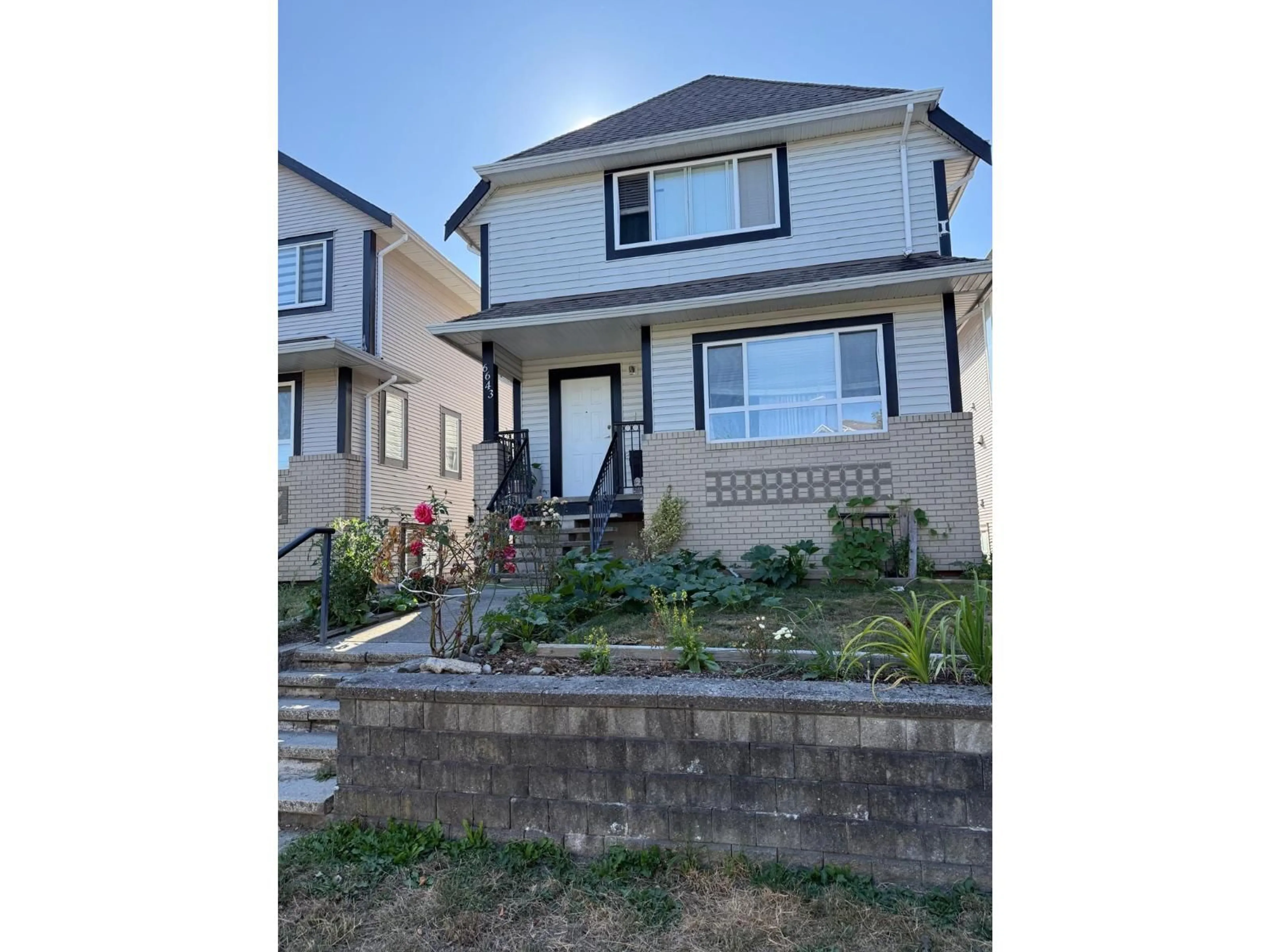 Home with vinyl exterior material, street for 6643 127 STREET, Surrey British Columbia V3W1G5