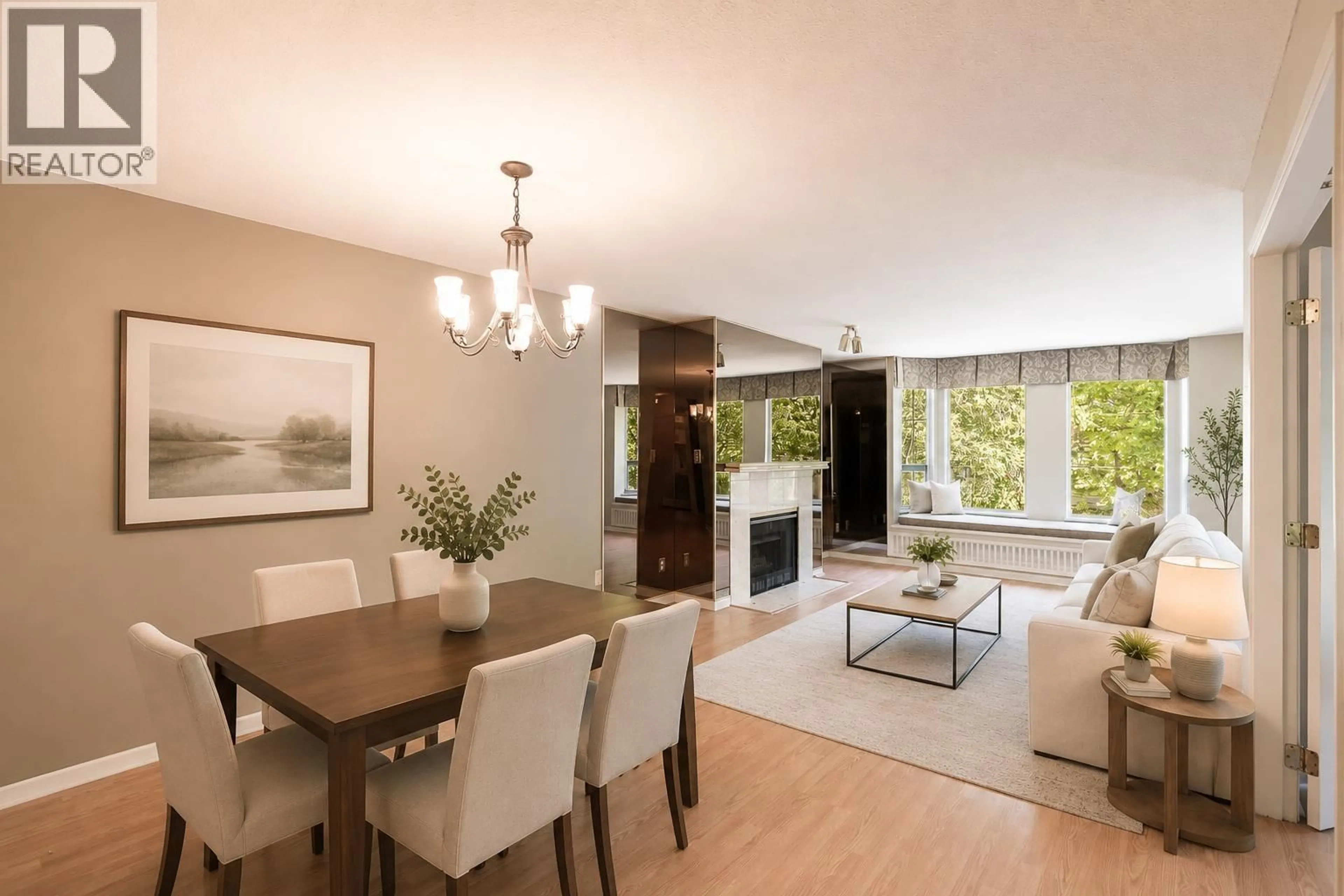 Living room with furniture, wood/laminate floor for 208 - 1695 AUGUSTA AVENUE, Burnaby British Columbia V5A4S8