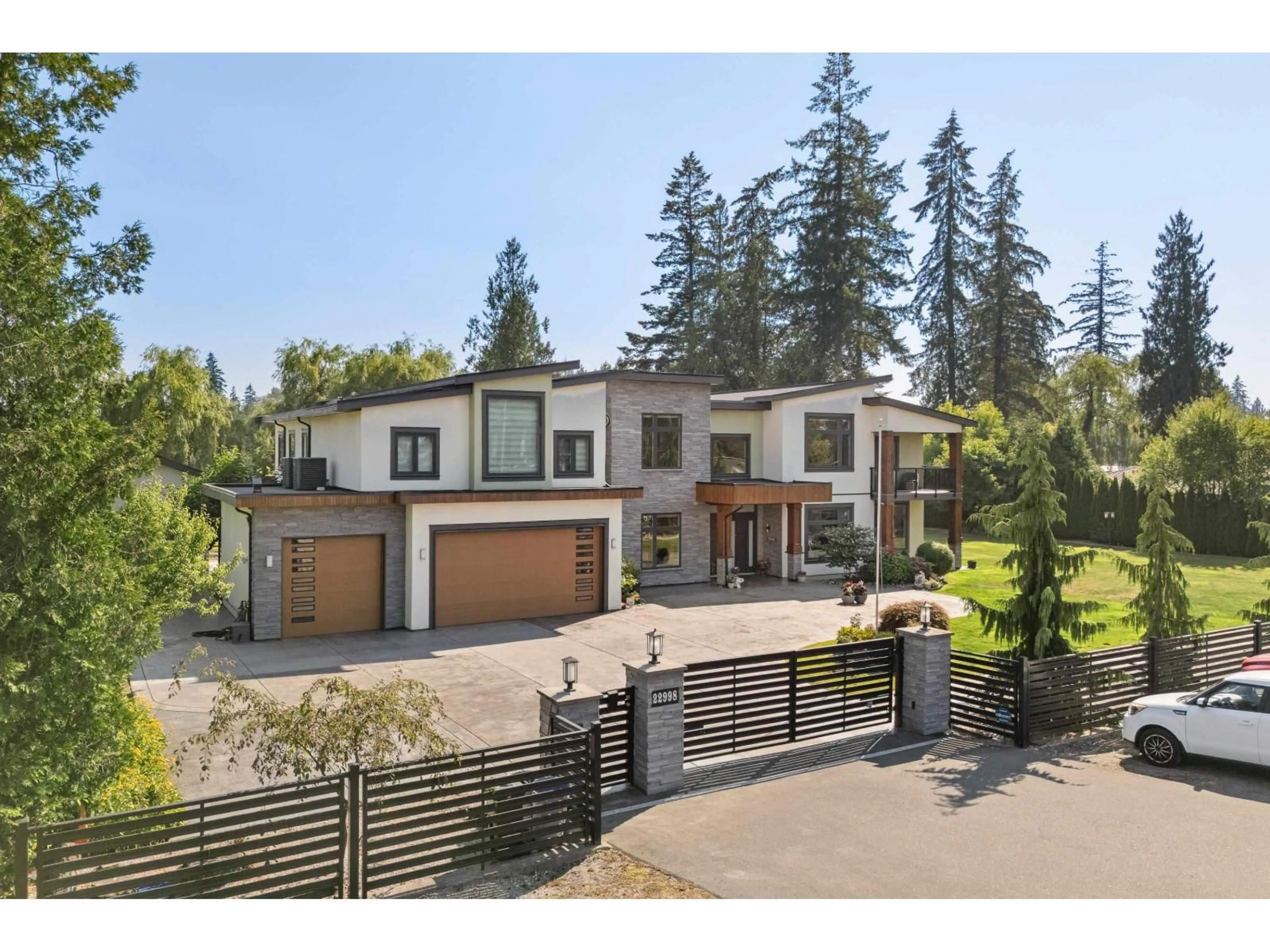 A pic from outside/outdoor area/front of a property/back of a property/a pic from drone, street for 22998 74 AVENUE, Langley British Columbia V2Y2S2