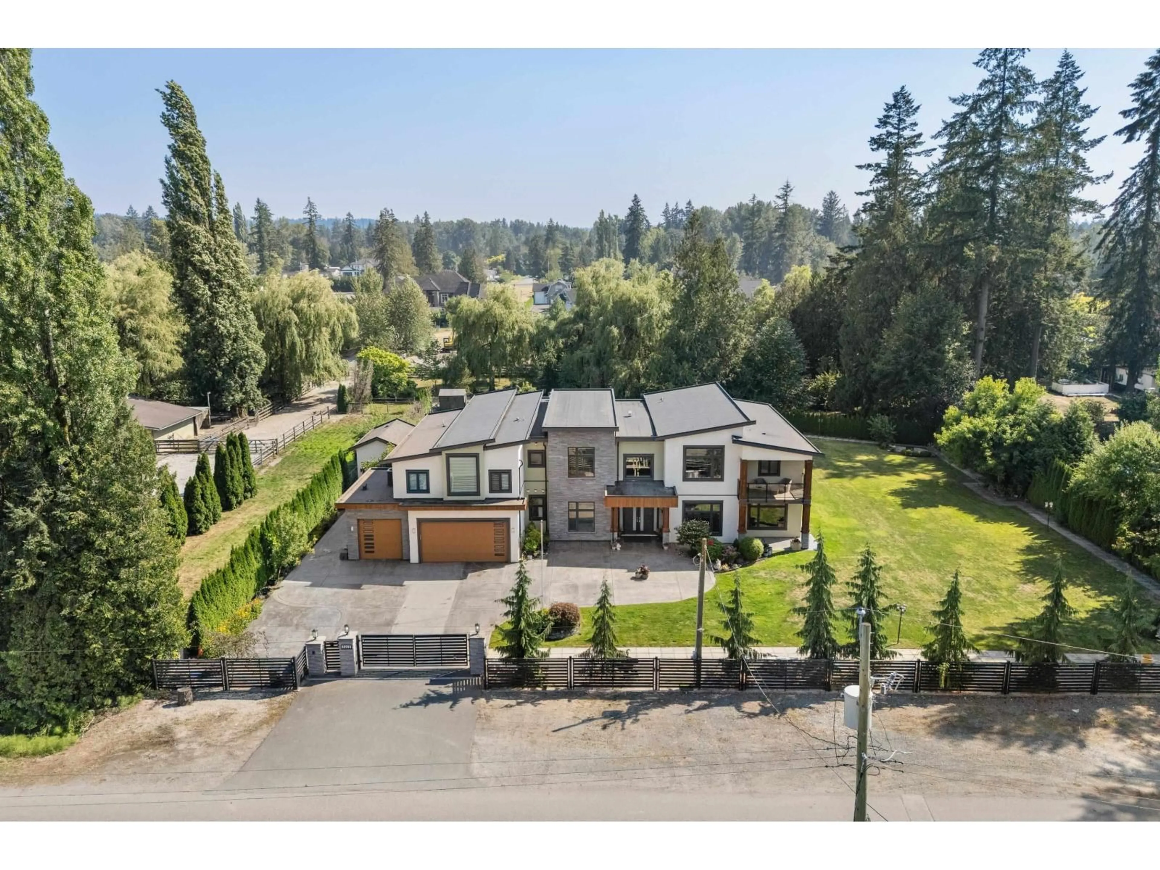 A pic from outside/outdoor area/front of a property/back of a property/a pic from drone, street for 22998 74 AVENUE, Langley British Columbia V2Y2S2