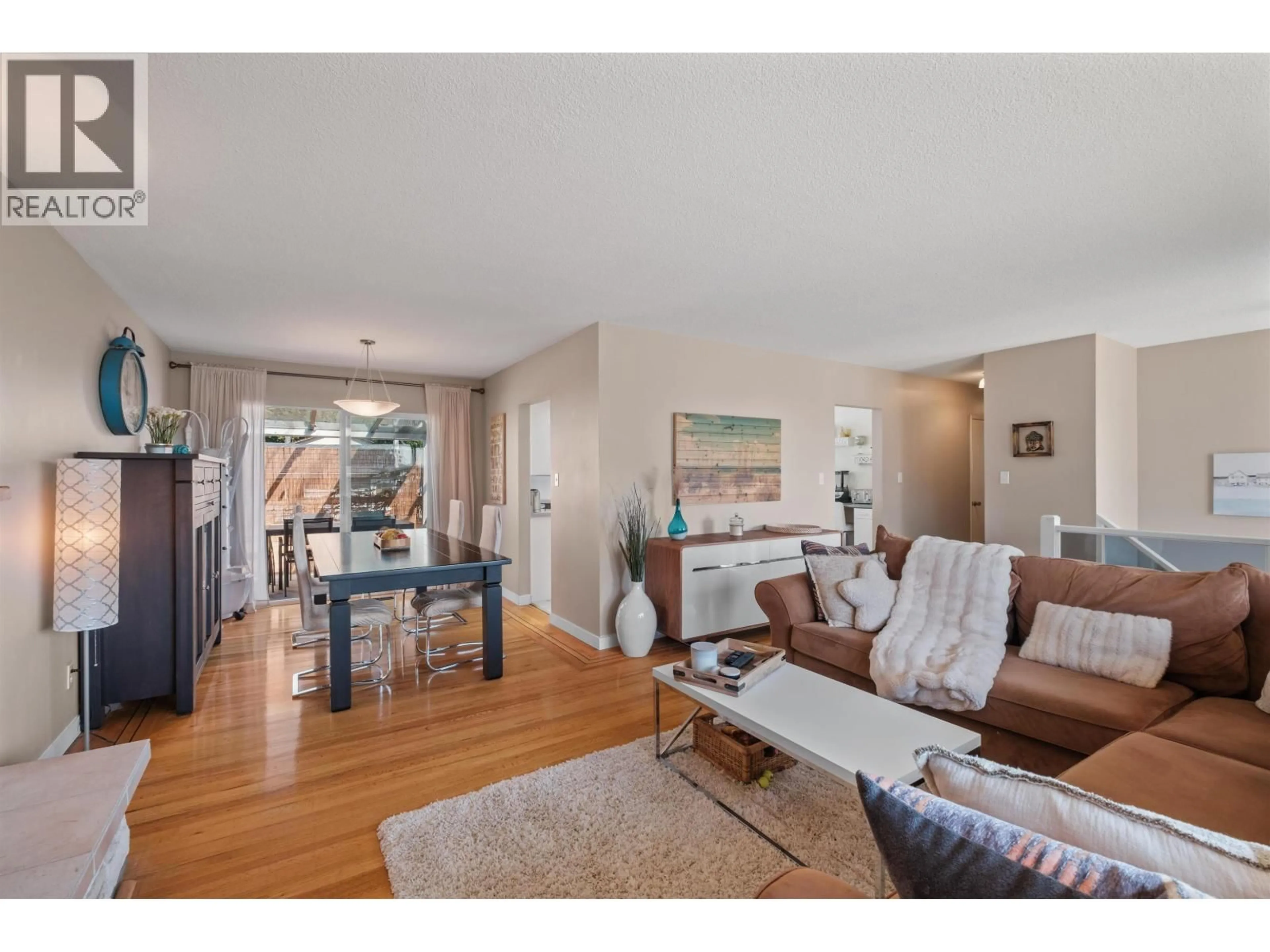 Living room with furniture, wood/laminate floor for 854 16TH STREET, North Vancouver British Columbia V7L2V4