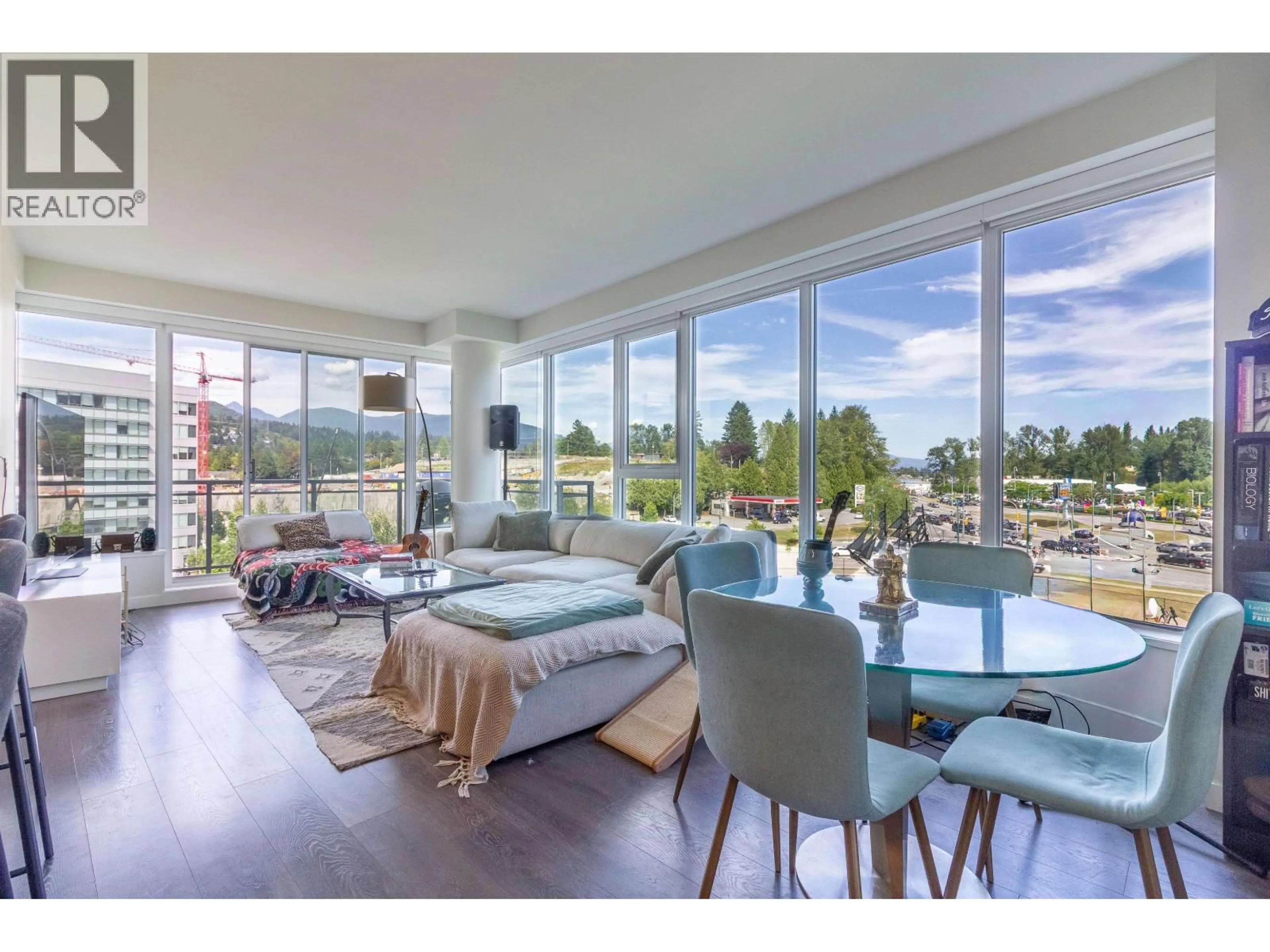 Living room with furniture, unknown for 902 - 308 MORRISSEY ROAD, Port Moody British Columbia V3H0M2