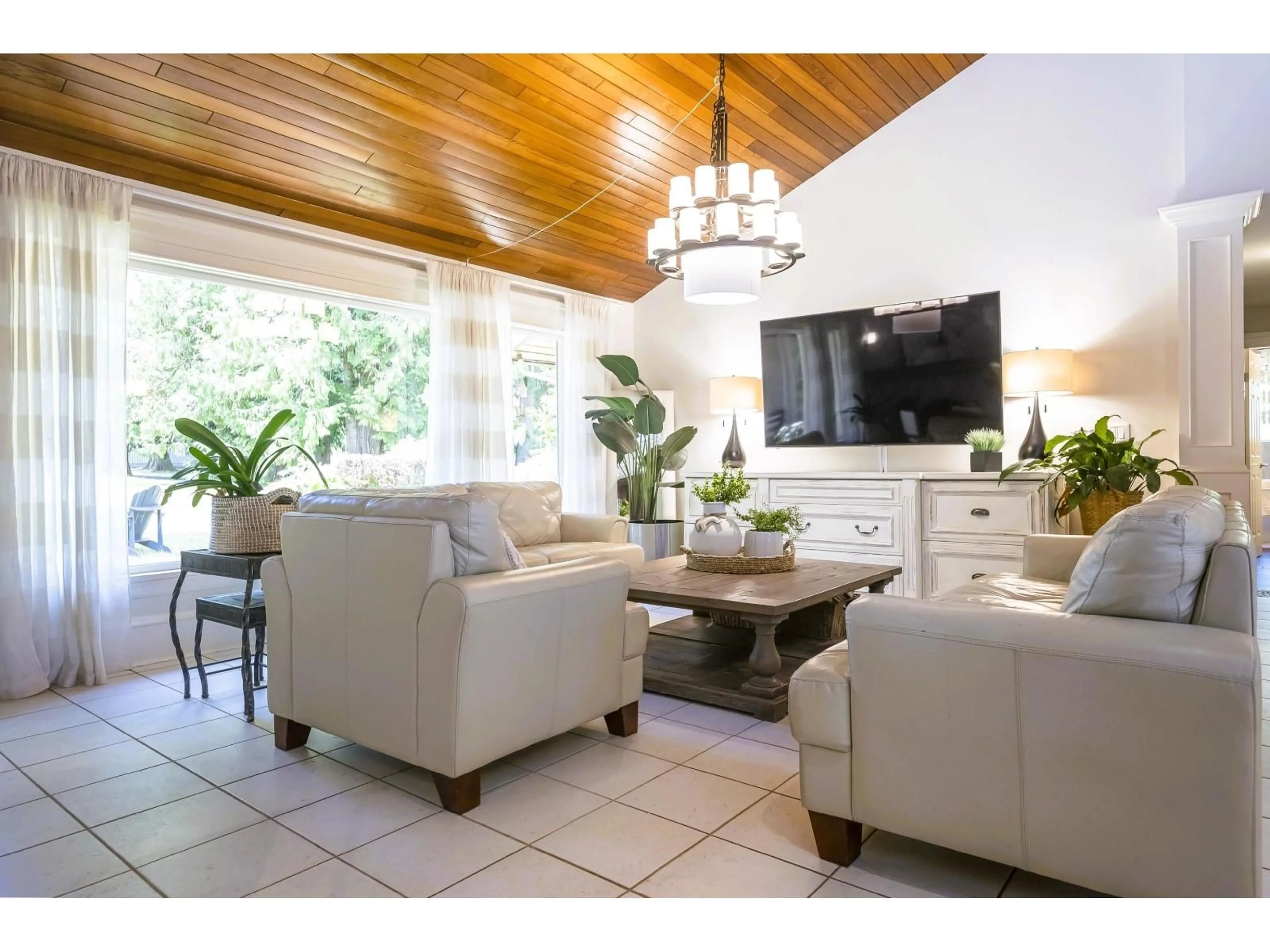 Living room with furniture, wood/laminate floor for 9837 MCKINNON CRESCENT, Langley British Columbia V1M3V6