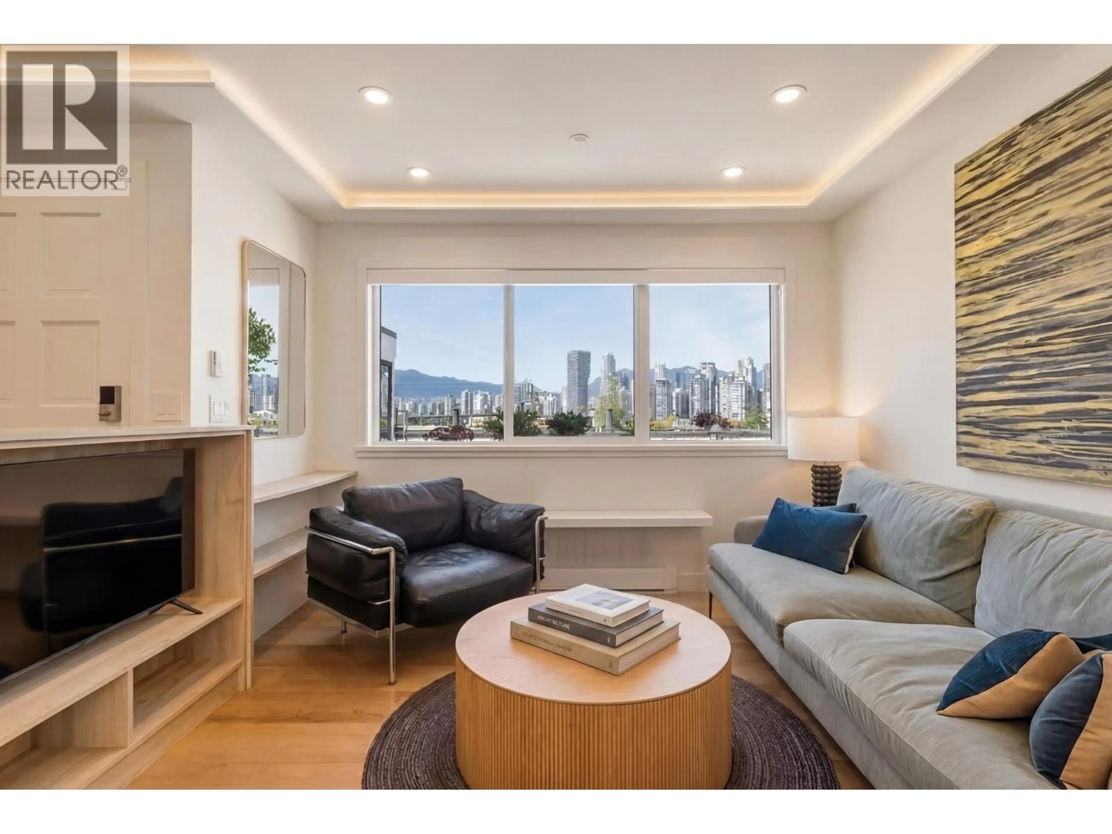 Living room with furniture, wood/laminate floor for 11 - 1214 7TH AVENUE, Vancouver British Columbia V6H1B6