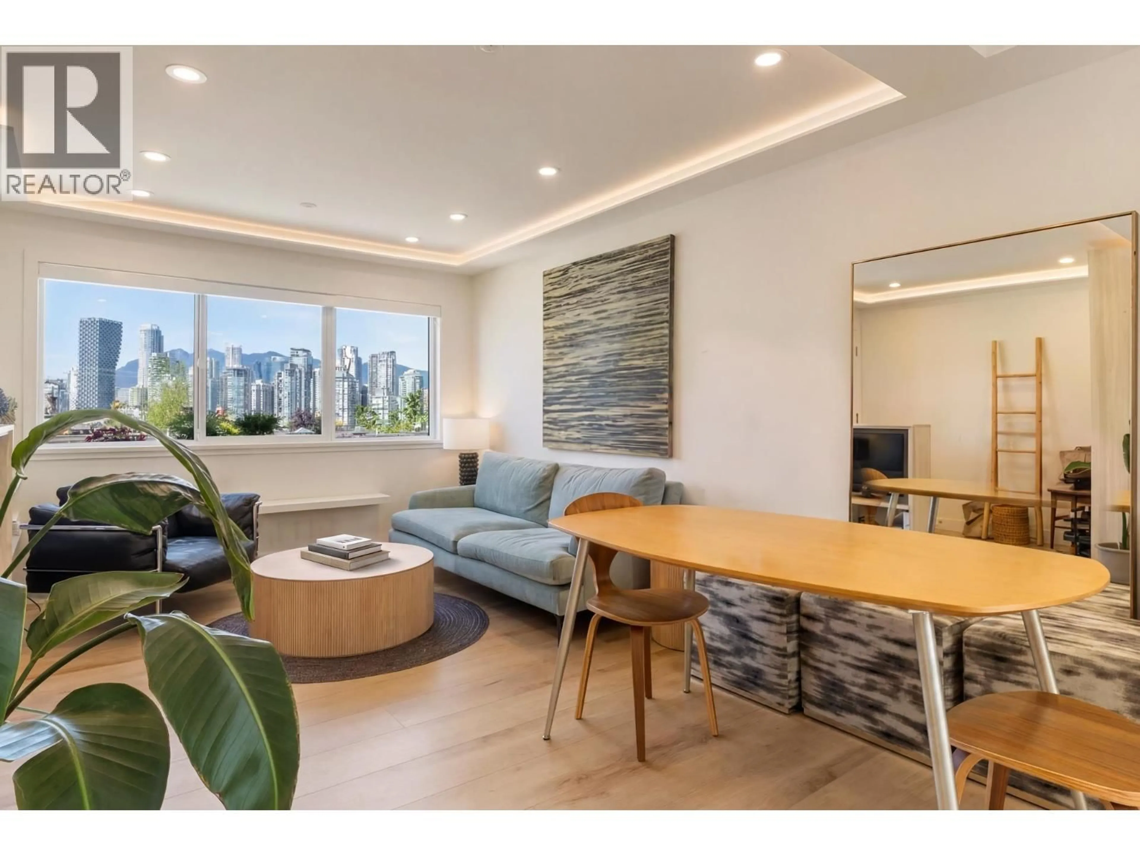 Living room with furniture, wood/laminate floor for 11 - 1214 7TH AVENUE, Vancouver British Columbia V6H1B6