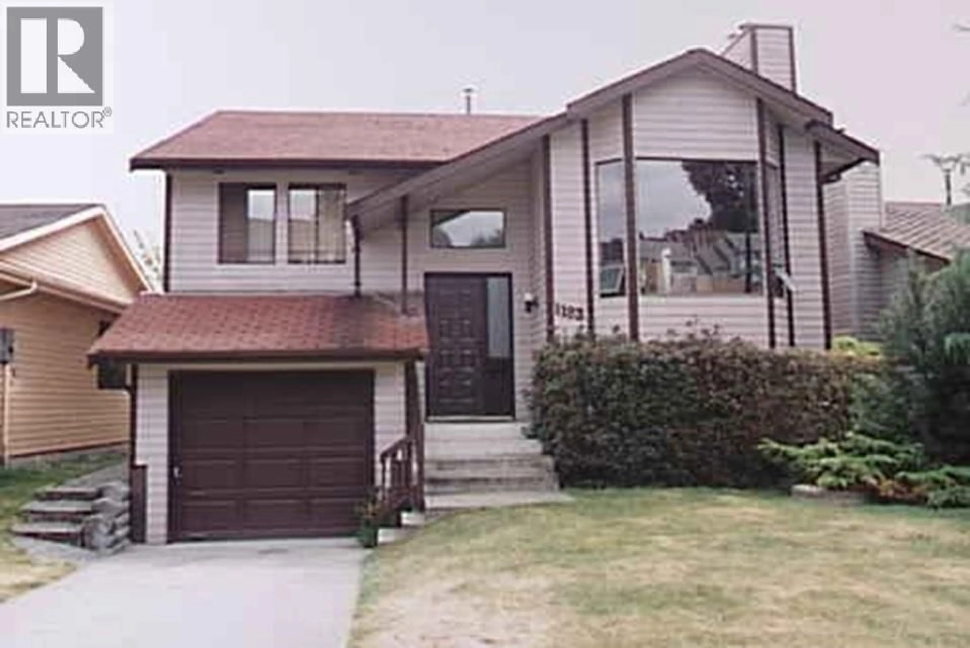 Home with vinyl exterior material, street for 1183 FALCON DRIVE, Coquitlam British Columbia V3E2C2