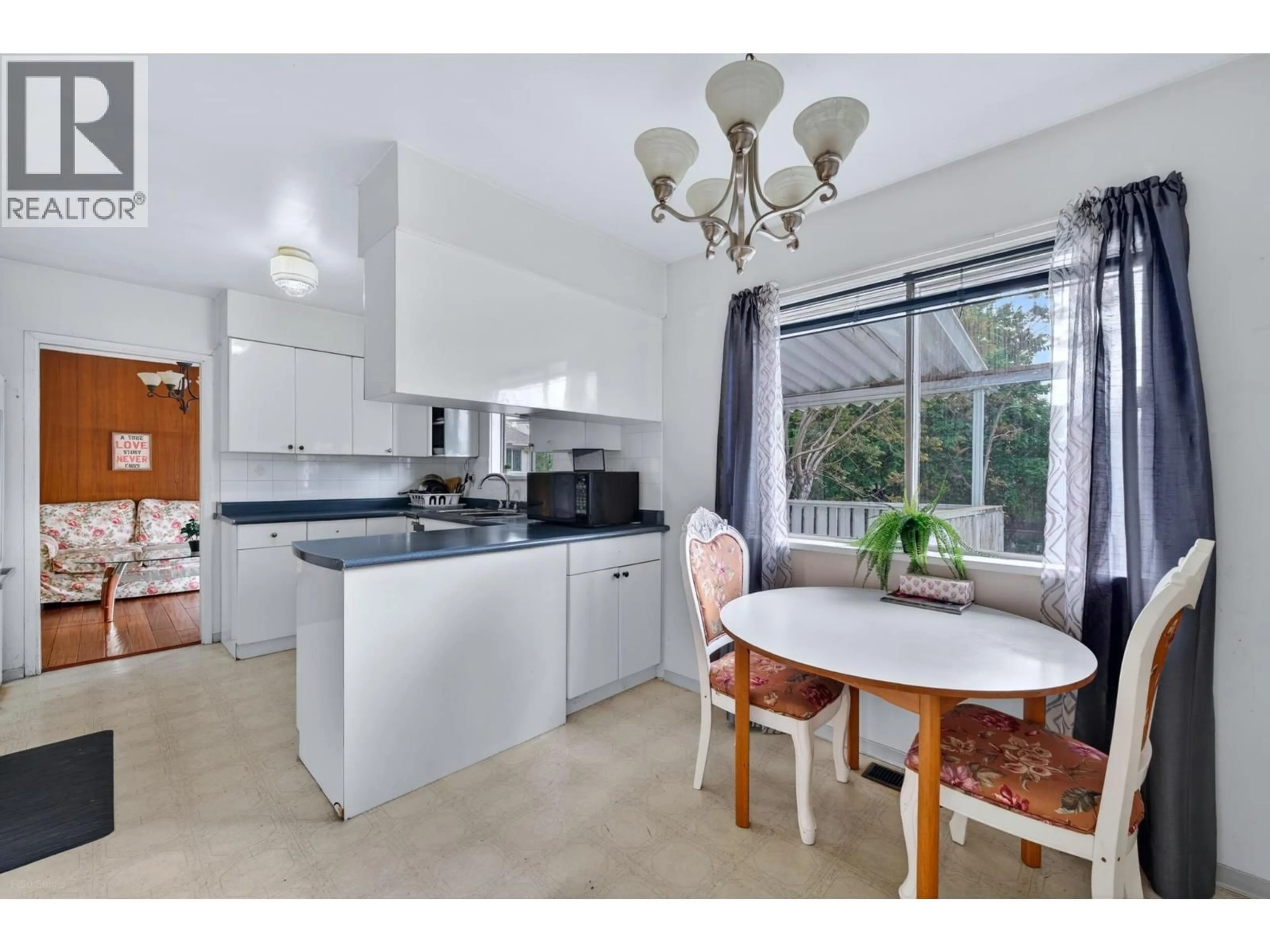 Open concept kitchen, ceramic/tile floor for 9031 NO. 2 ROAD, Richmond British Columbia V7E2C6