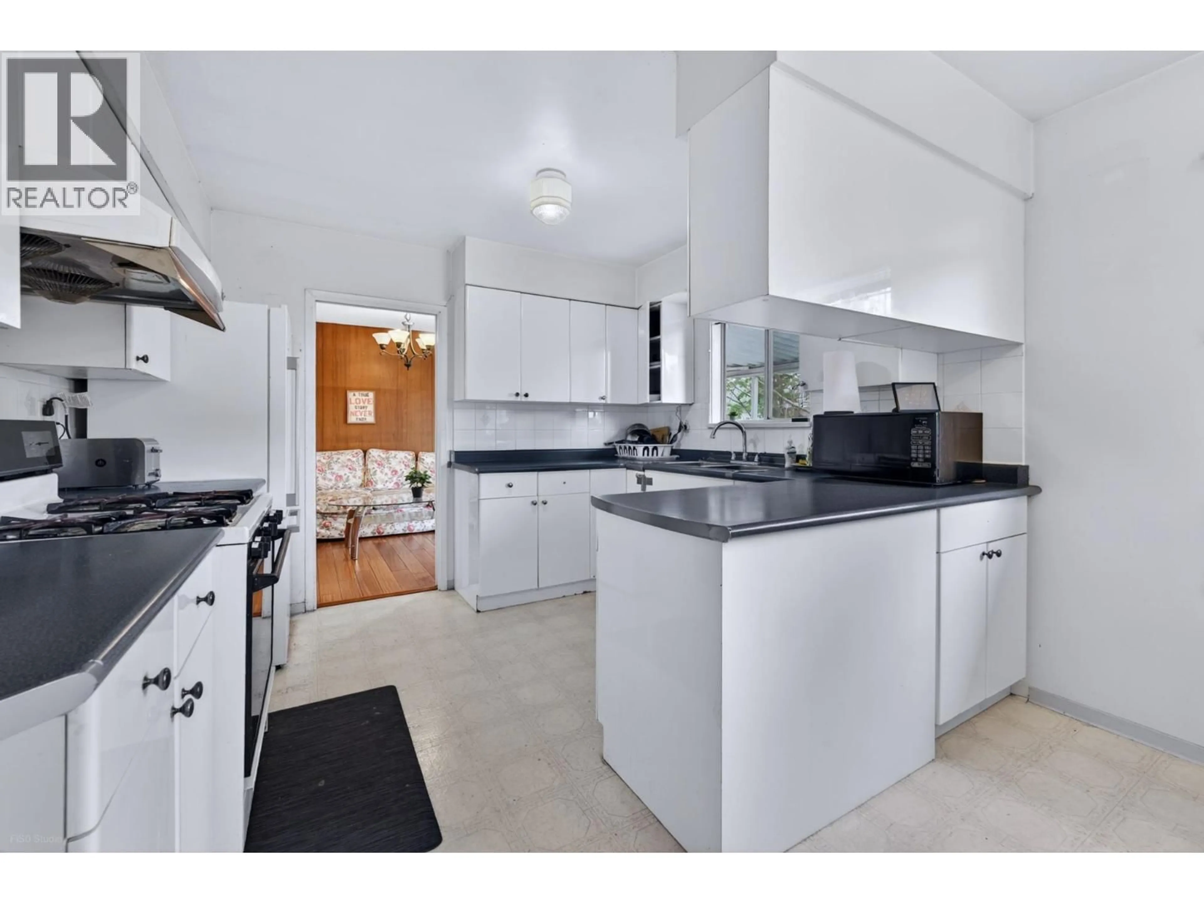 Standard kitchen, ceramic/tile floor for 9031 NO. 2 ROAD, Richmond British Columbia V7E2C6