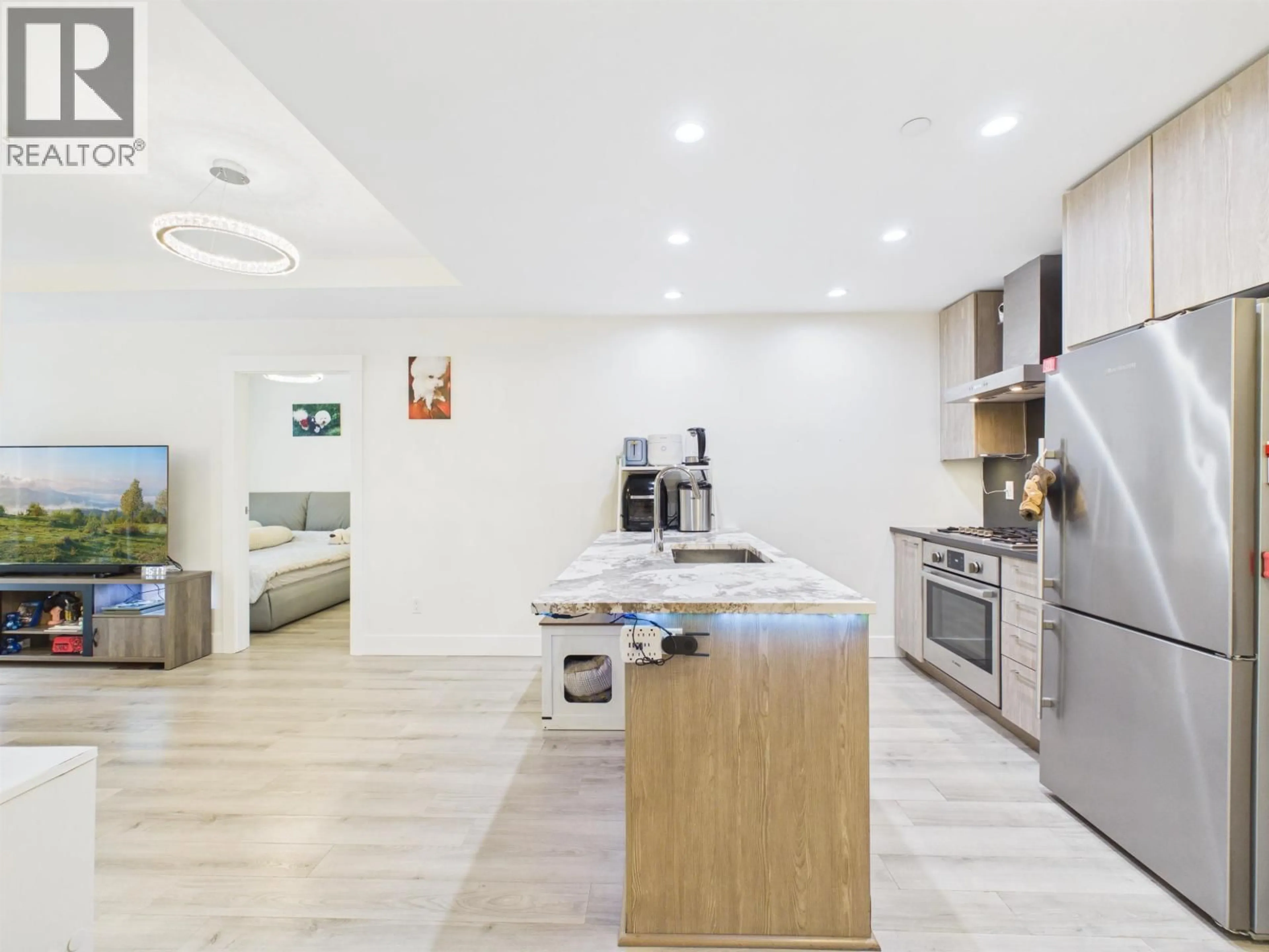 Open concept kitchen, unknown for 102 - 10788 NO. 5 ROAD, Richmond British Columbia V6W0B7