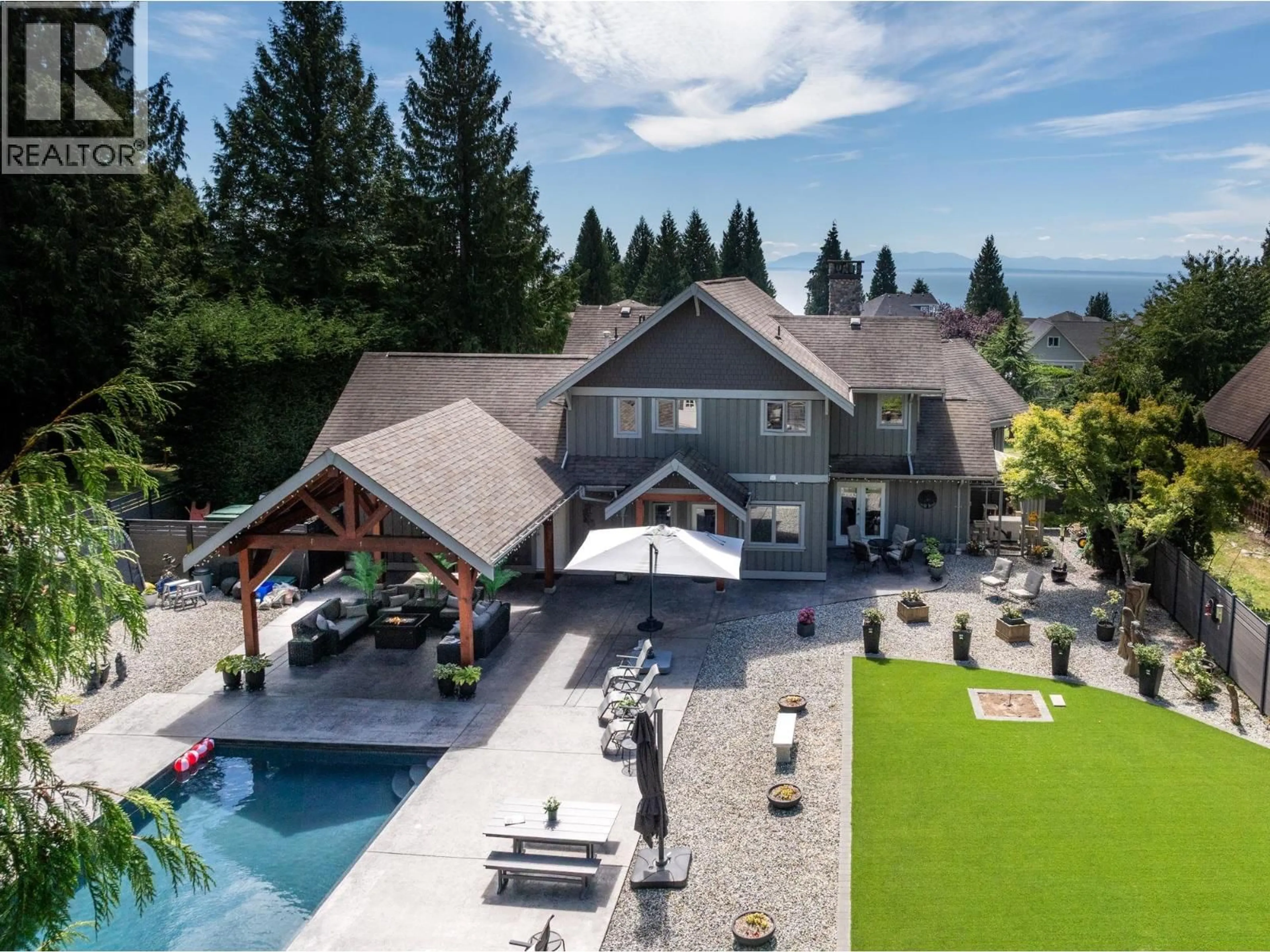 A pic from outside/outdoor area/front of a property/back of a property/a pic from drone, mountain view for 1474 VERNON DRIVE, Gibsons British Columbia V0N1V5