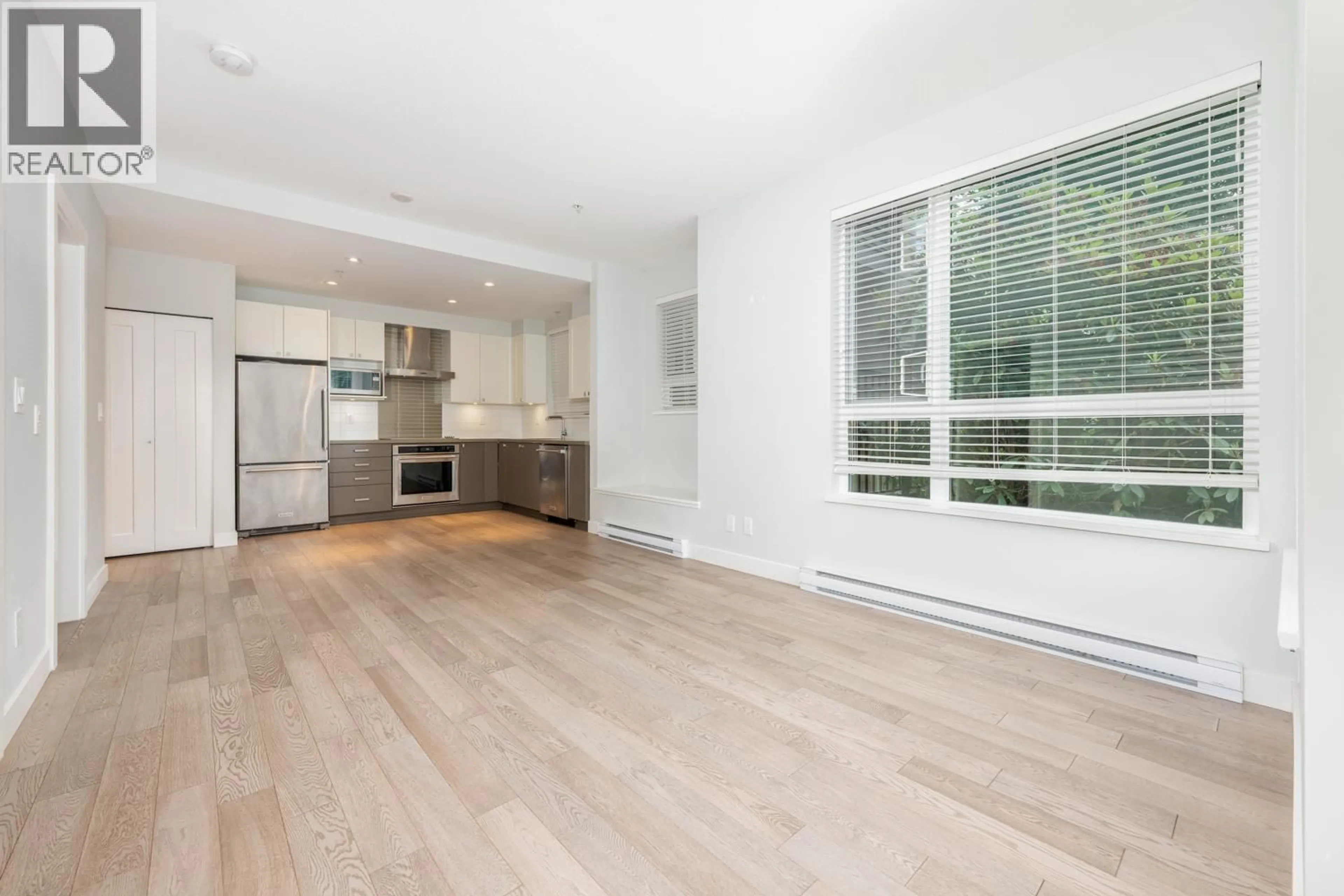 Open concept kitchen, wood/laminate floor for 5 - 3221 NOEL DRIVE, Burnaby British Columbia V3J0H3