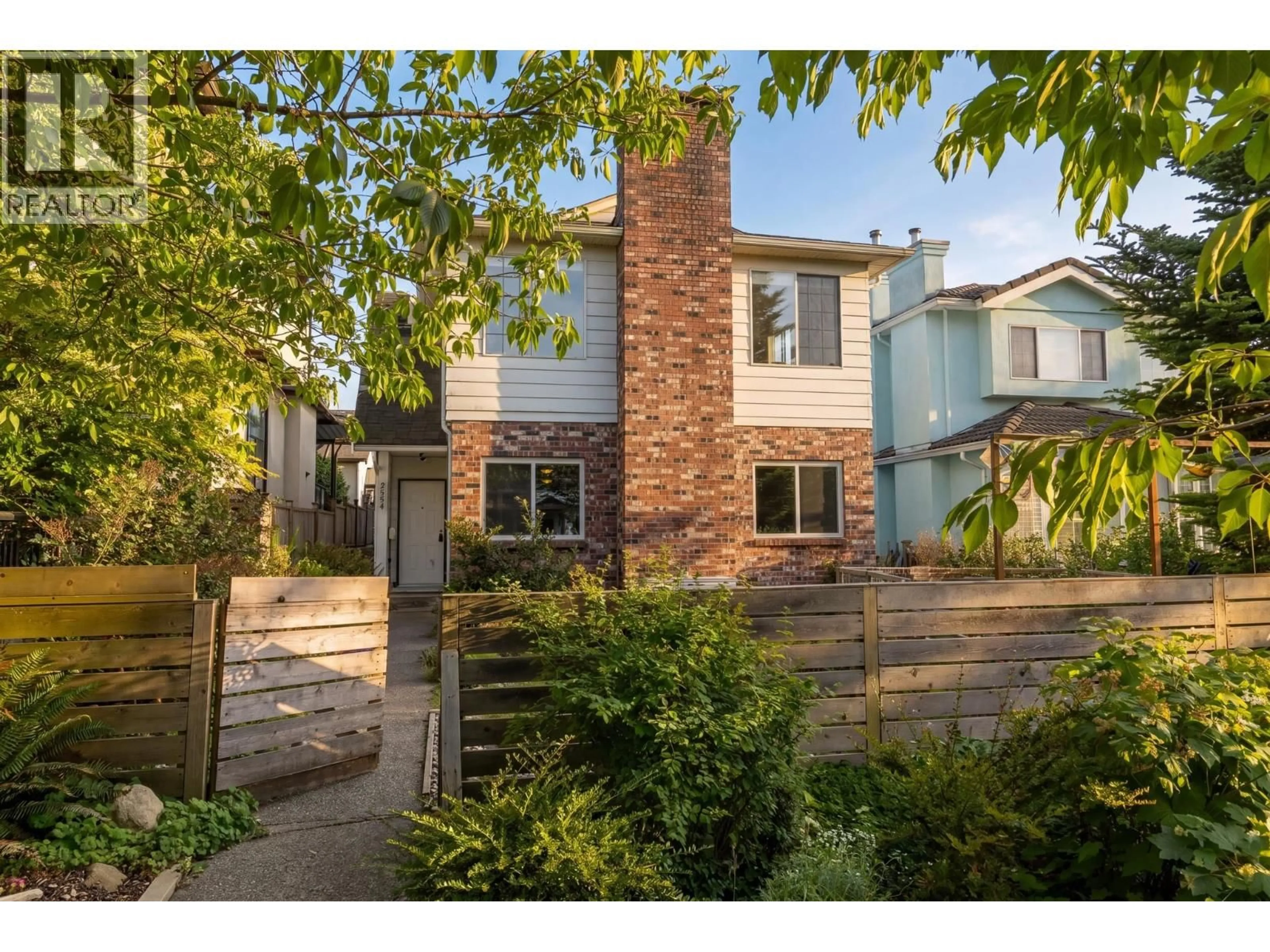 Home with brick exterior material, street for 2554 7TH AVENUE, Vancouver British Columbia V5M1T4