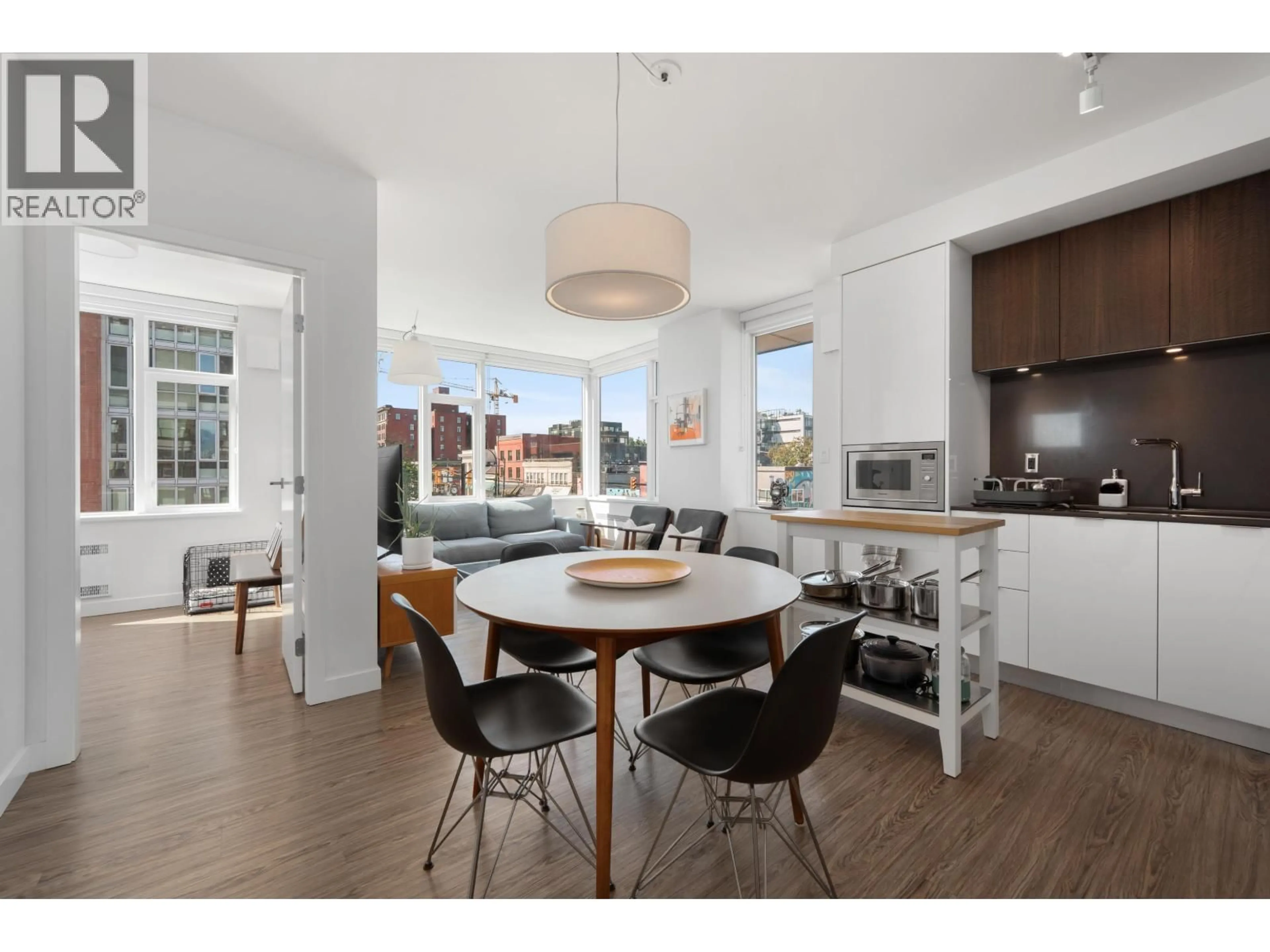 Open concept kitchen, wood/laminate floor for 414 - 209 7TH AVENUE, Vancouver British Columbia V3L1W4