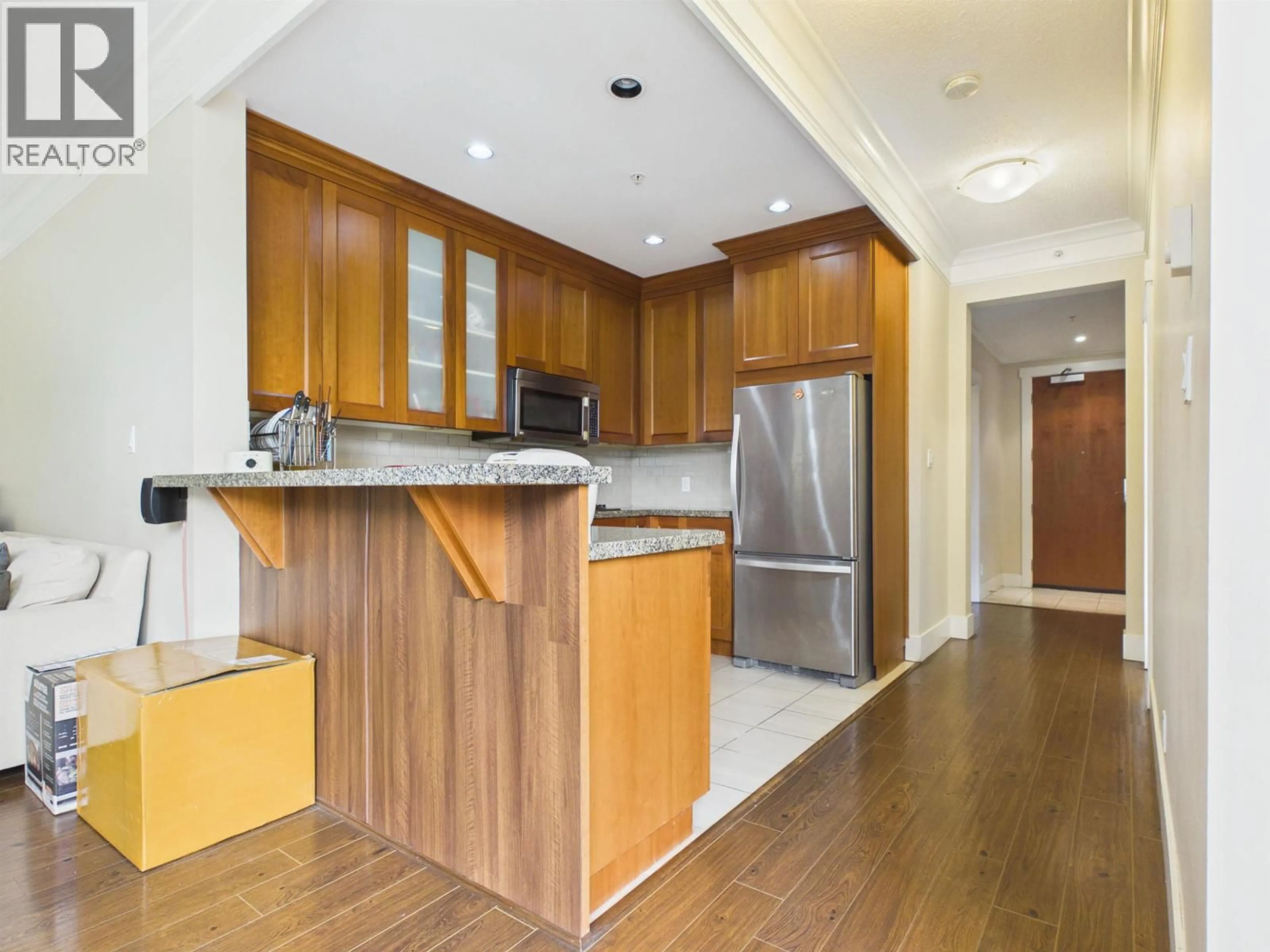 Open concept kitchen, wood/laminate floor for 401 - 4759 VALLEY DRIVE, Vancouver British Columbia V6J4B7