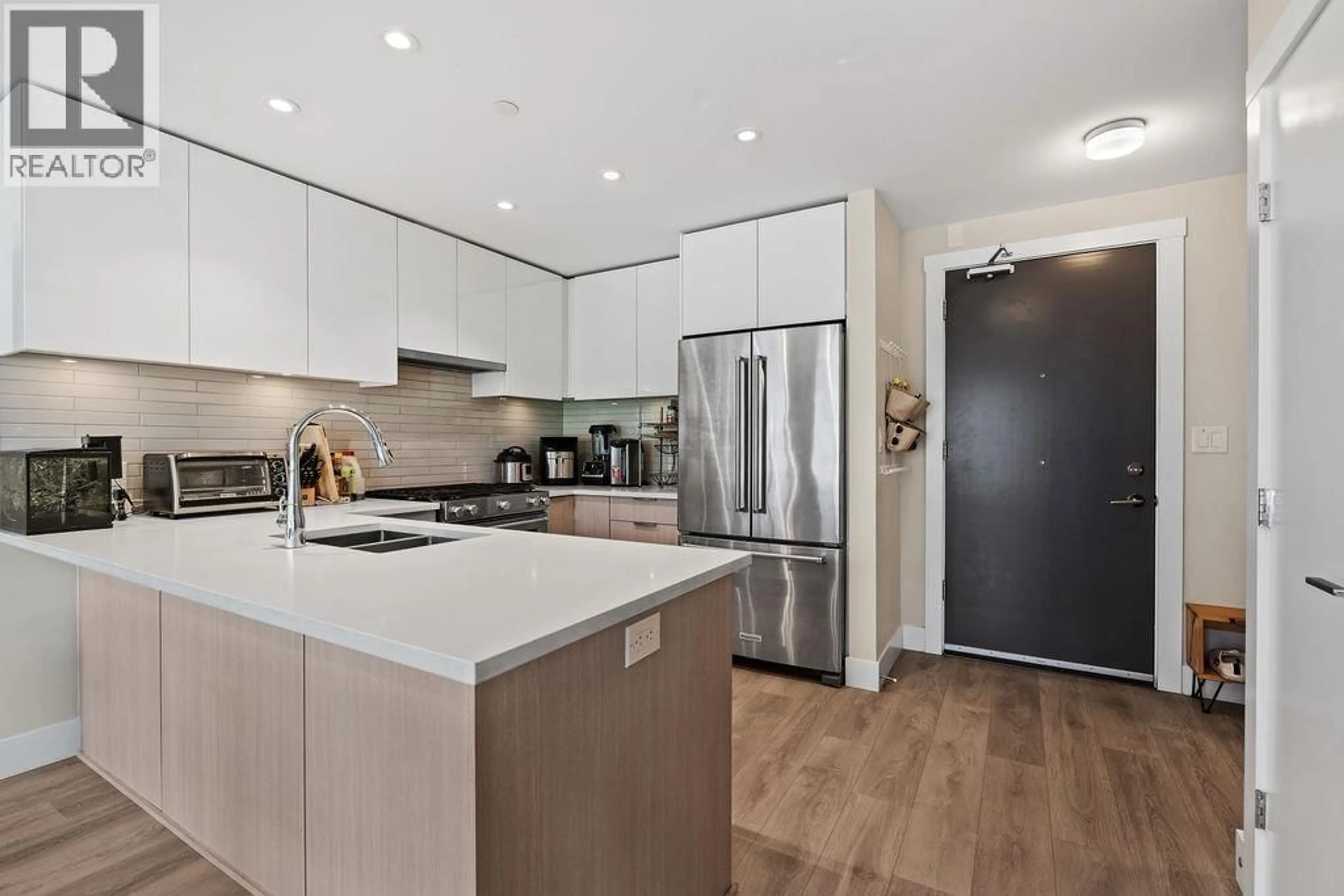 Open concept kitchen, unknown for 409 - 8508 RIVERGRASS DRIVE, Vancouver British Columbia V5S0H7