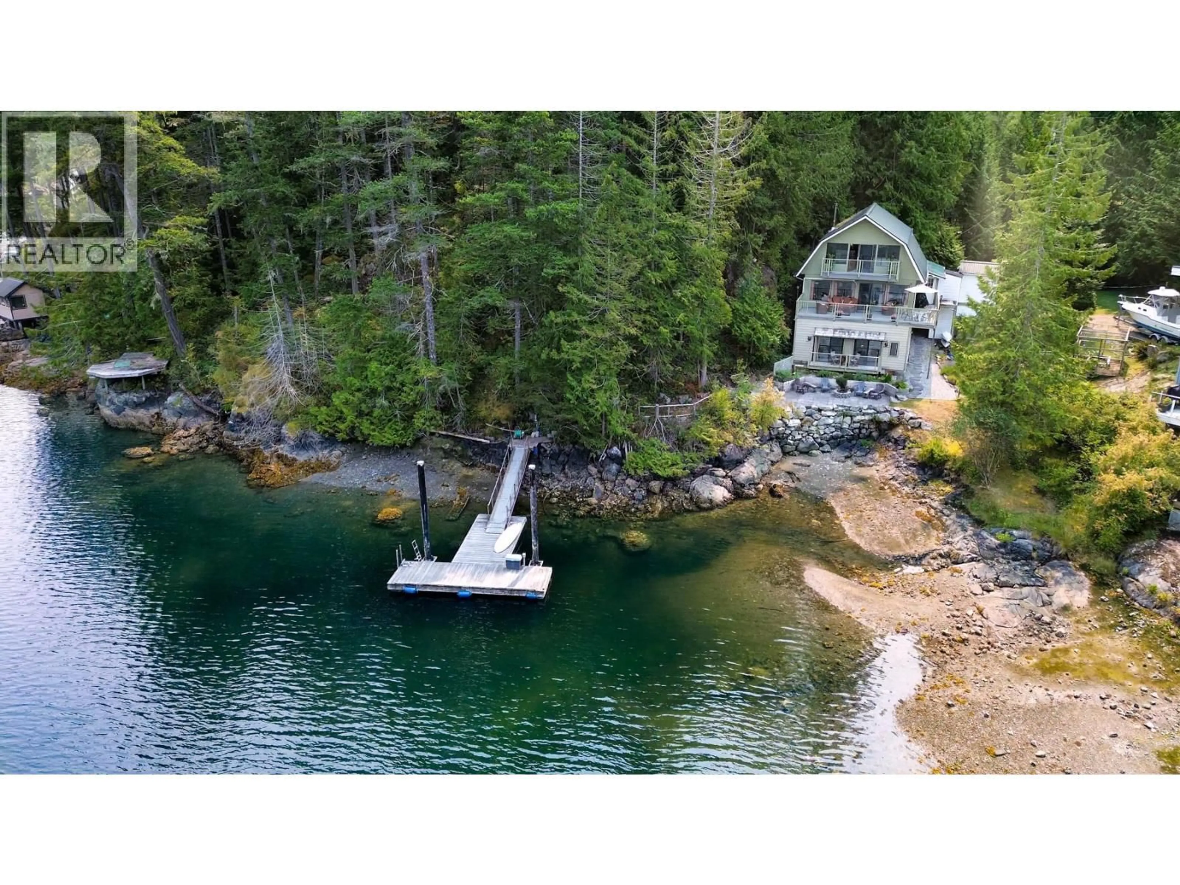 A pic from outside/outdoor area/front of a property/back of a property/a pic from drone, water/lake/river/ocean view for 9812 WESCAN ROAD, Halfmoon Bay British Columbia V0N1Y2